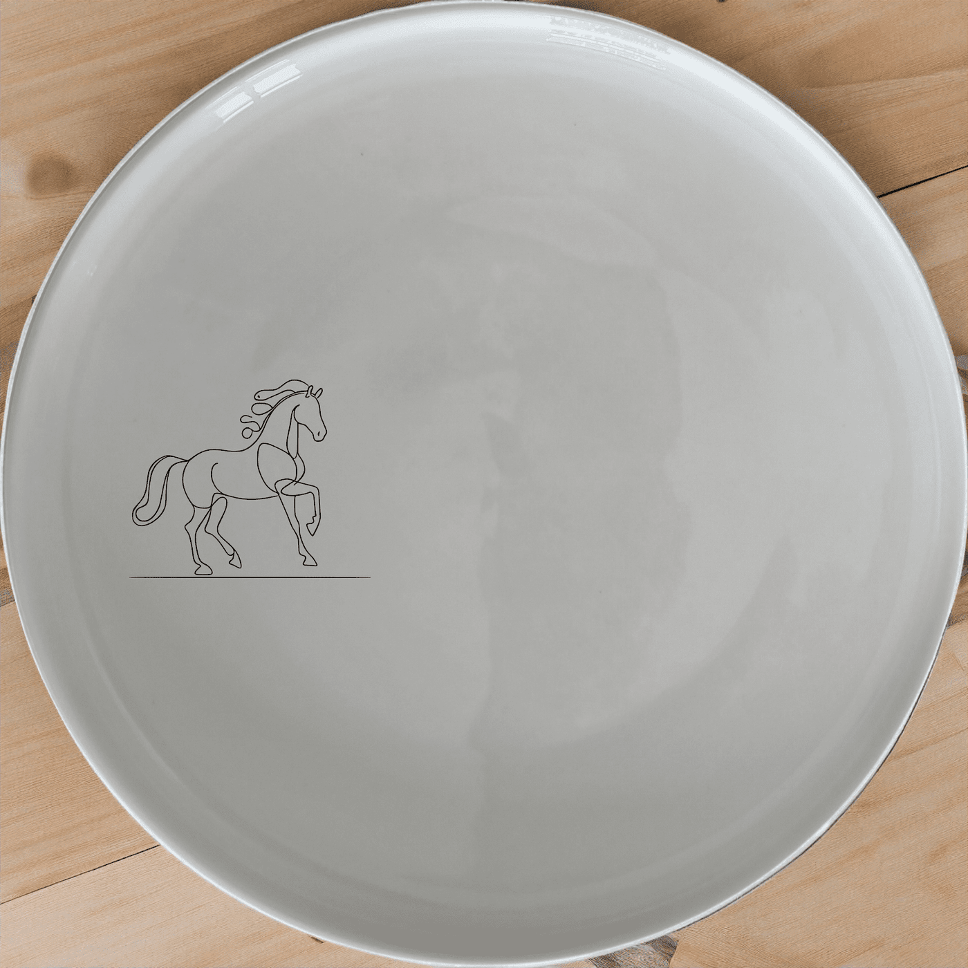 Year of Fire Horse Side Plate Set of 4 - Range 4 is a stunning set of four 21cm white ceramic side plates featuring a laser-etched design of a dynamic horse in motion, perfect for adding a touch of elegance to any dining table.