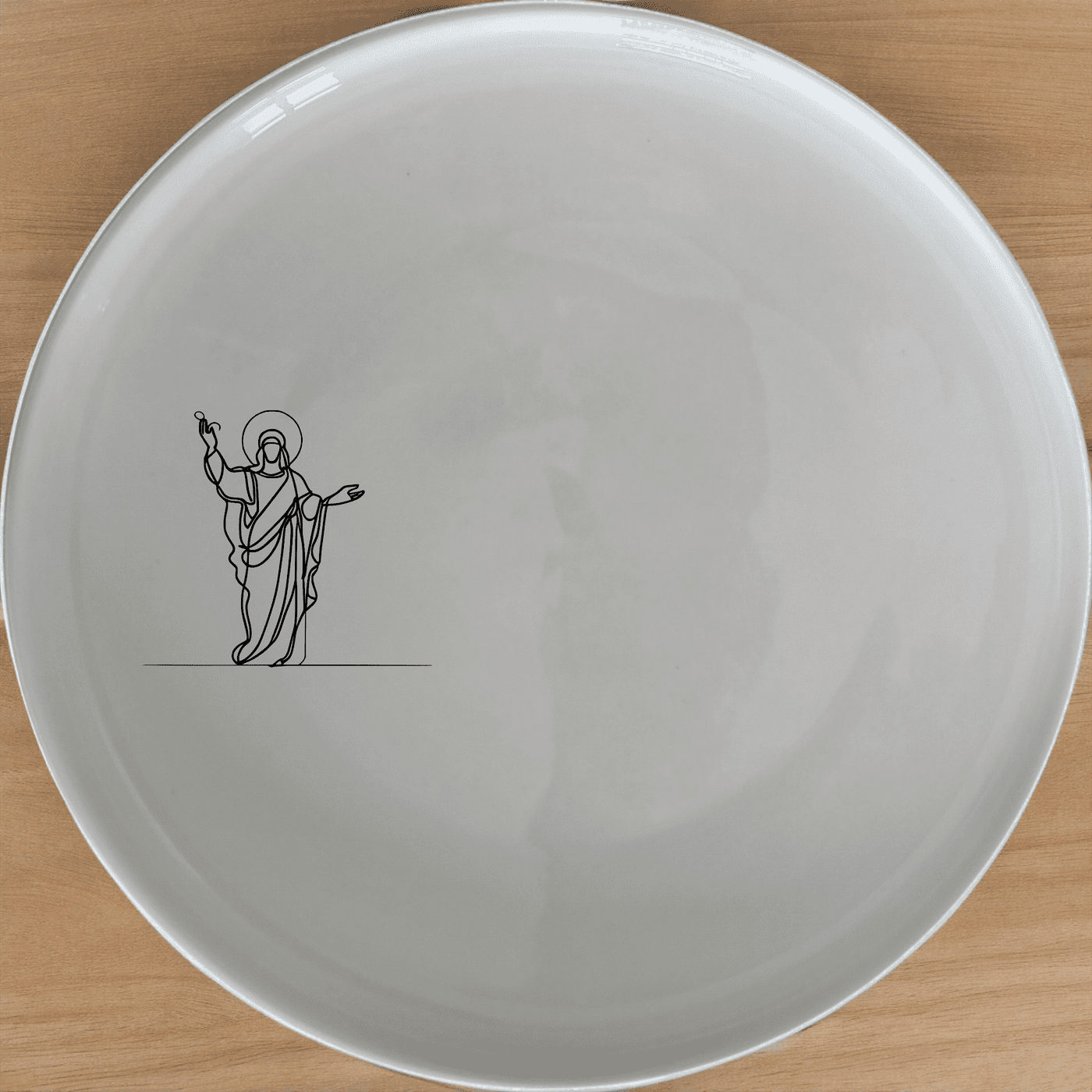 The Christian Imagery Dinner Plate Set of 4 features elegant laser-etched designs perfect for special occasions and daily use.