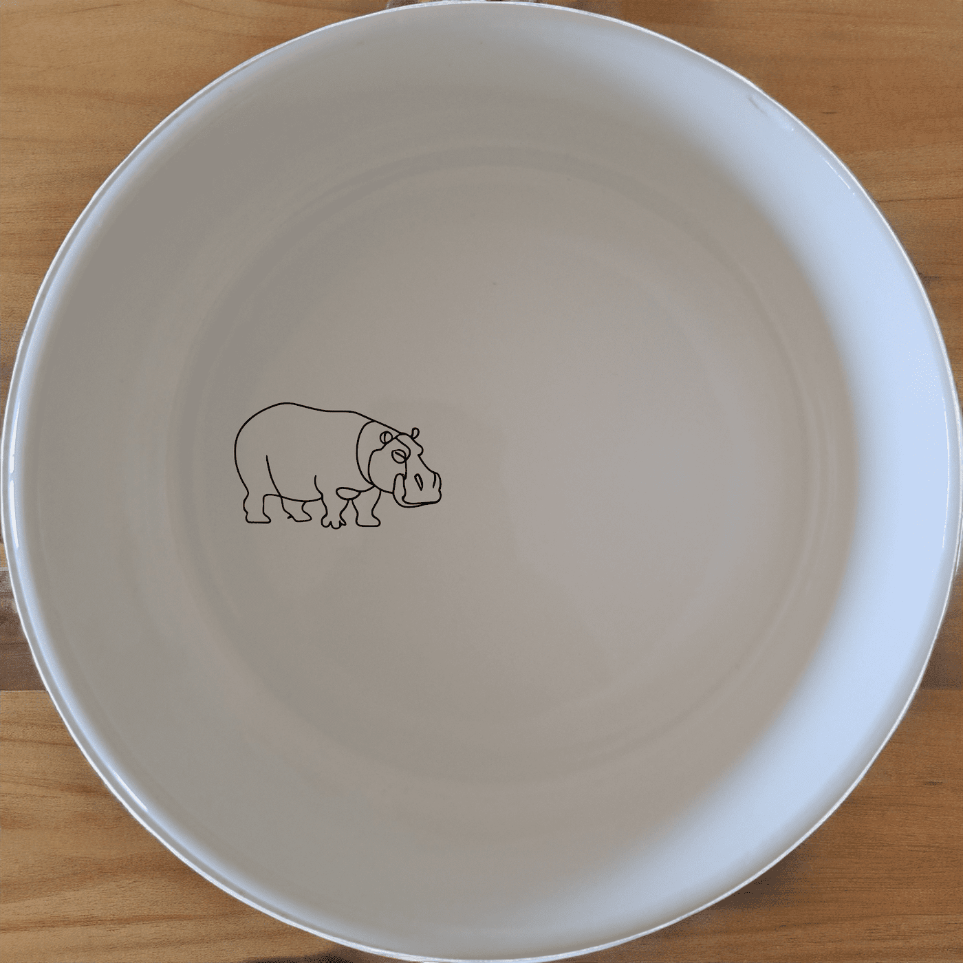 The Curvey Silhouette Hippo Bowl Set of 4 - Range 3 features a sleek, modern design with a subtle hippo silhouette etched into each bowl. Perfect for everyday use or special occasions.