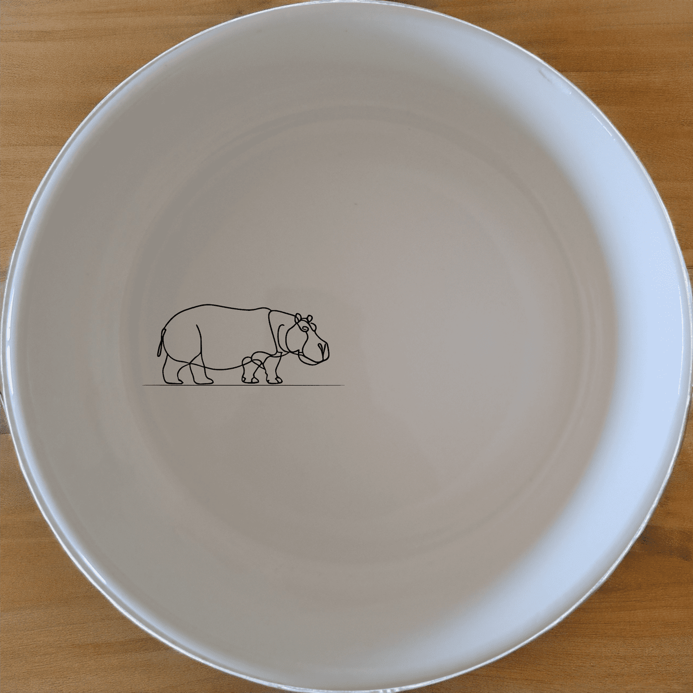 Curvey Silhouette Hippo Bowl Set of 4 - Range 4 is a stylish and practical addition to any kitchen, perfect for everyday use or special occasions.
