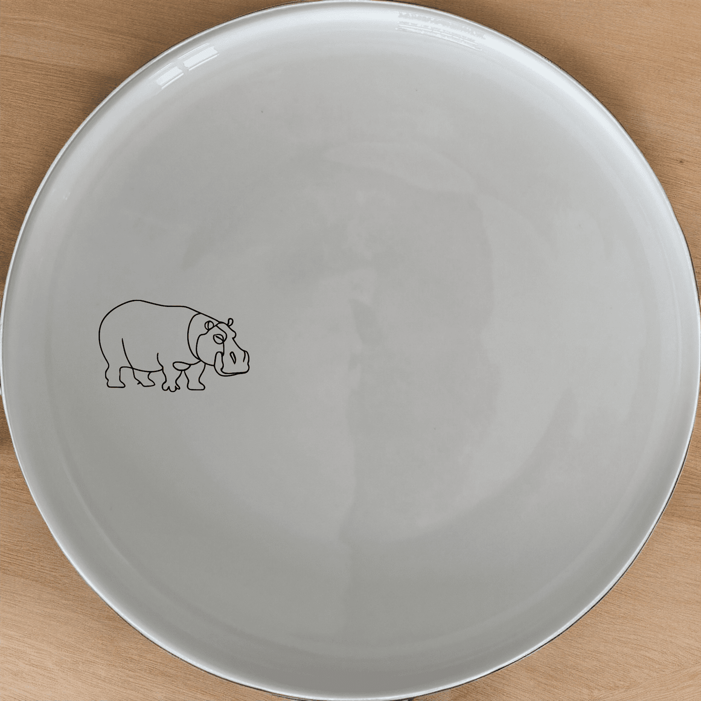 The Curvey Sillohuette Hippo Dinner Plate Set of 4 - Range 3 offers a modern and stylish addition to your dinnerware collection.