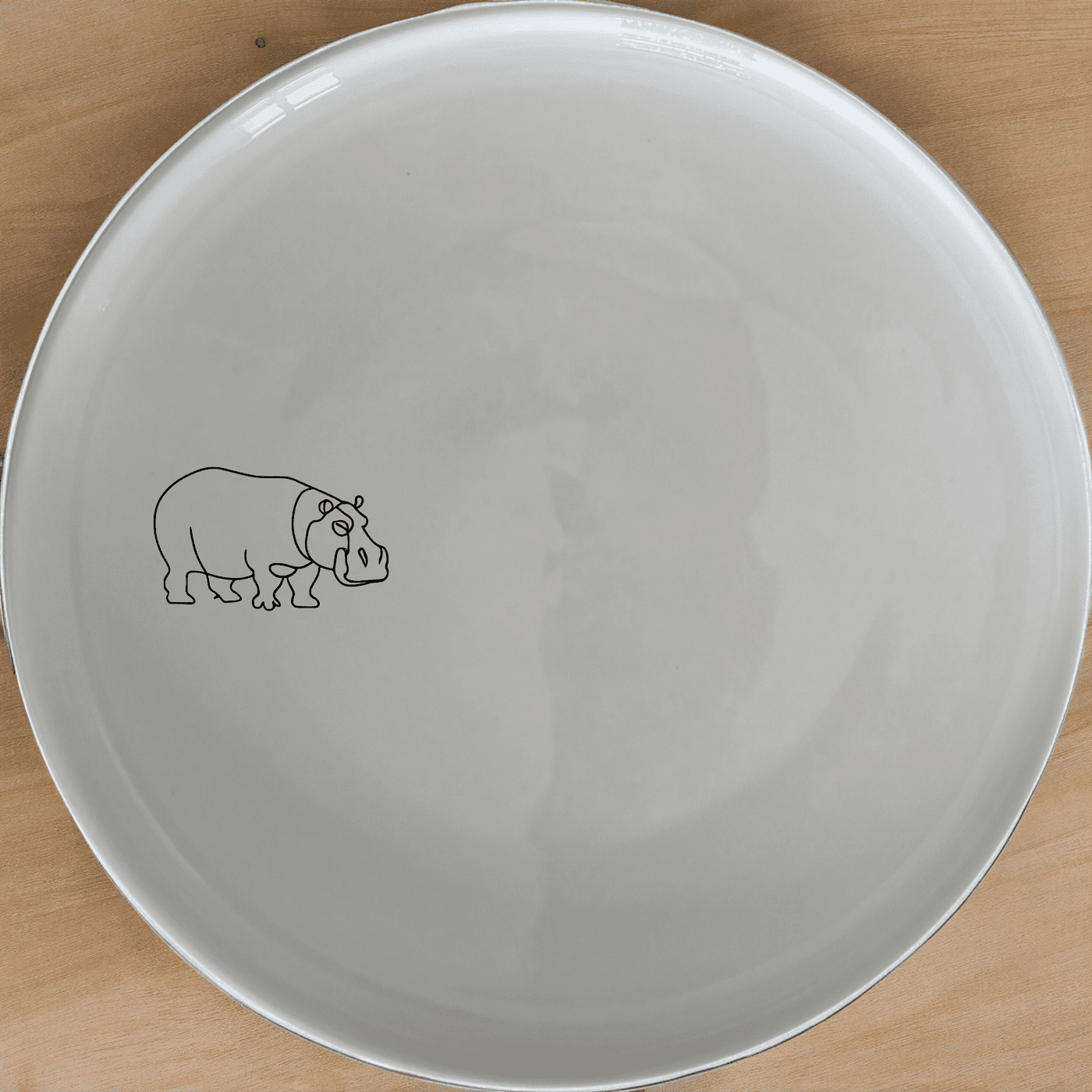 Curvey Sillohuette Hippo Side Plate Set of 4 - Range 3 adds a modern touch to your dining table with its sleek design and unique silhouette.