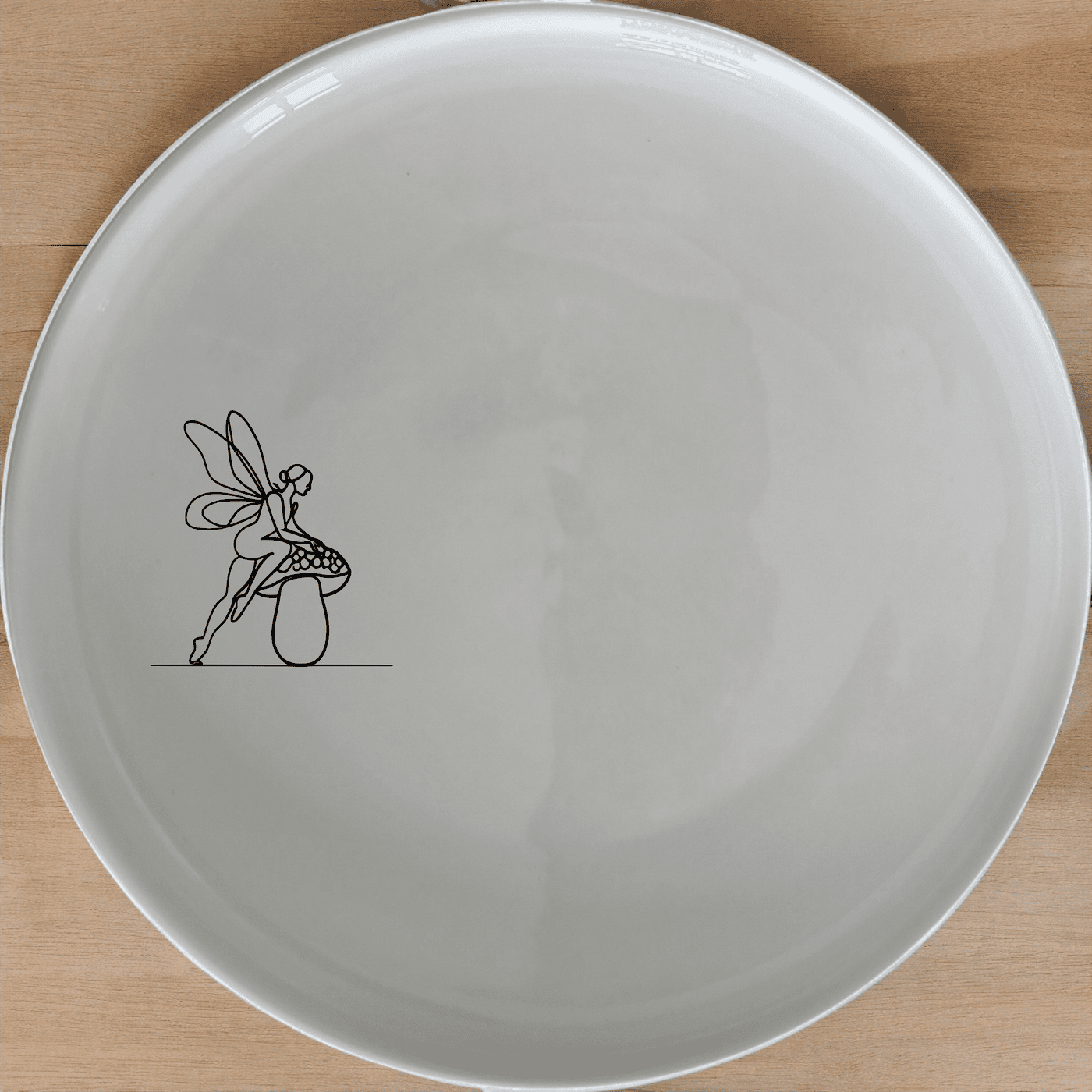 The Delicate Fairy Toadstool Dinner Plate Set of 4 adds a touch of whimsy to your dining table with its elegant fairy design.