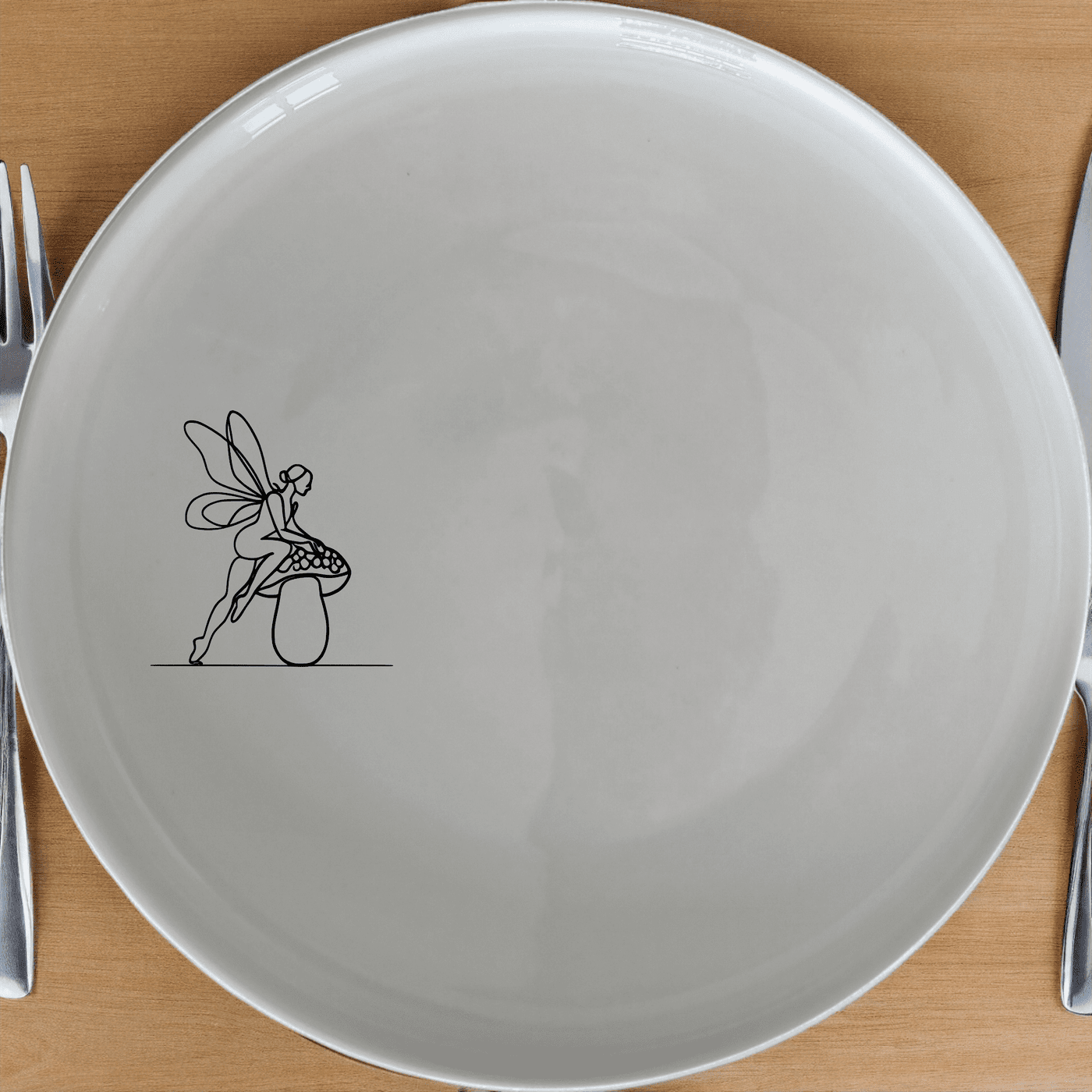 The Delicate Fairy Toadstool Side Plate Set of 4 features an enchanting illustration of a fairy on a toadstool, perfect for adding a touch of magic to your dining table.