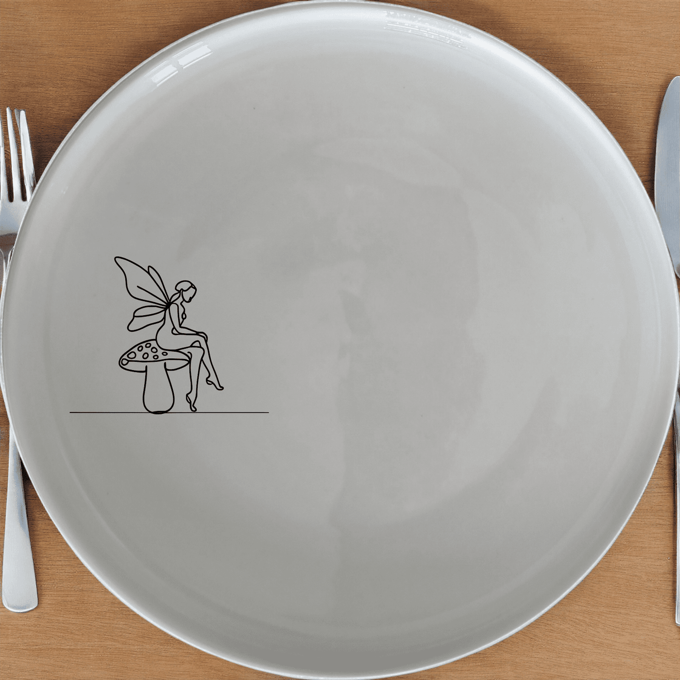 The Delicate Fairy Toadstool Side Plate Set of 4 adds a touch of whimsy to your dining table with its charming design.