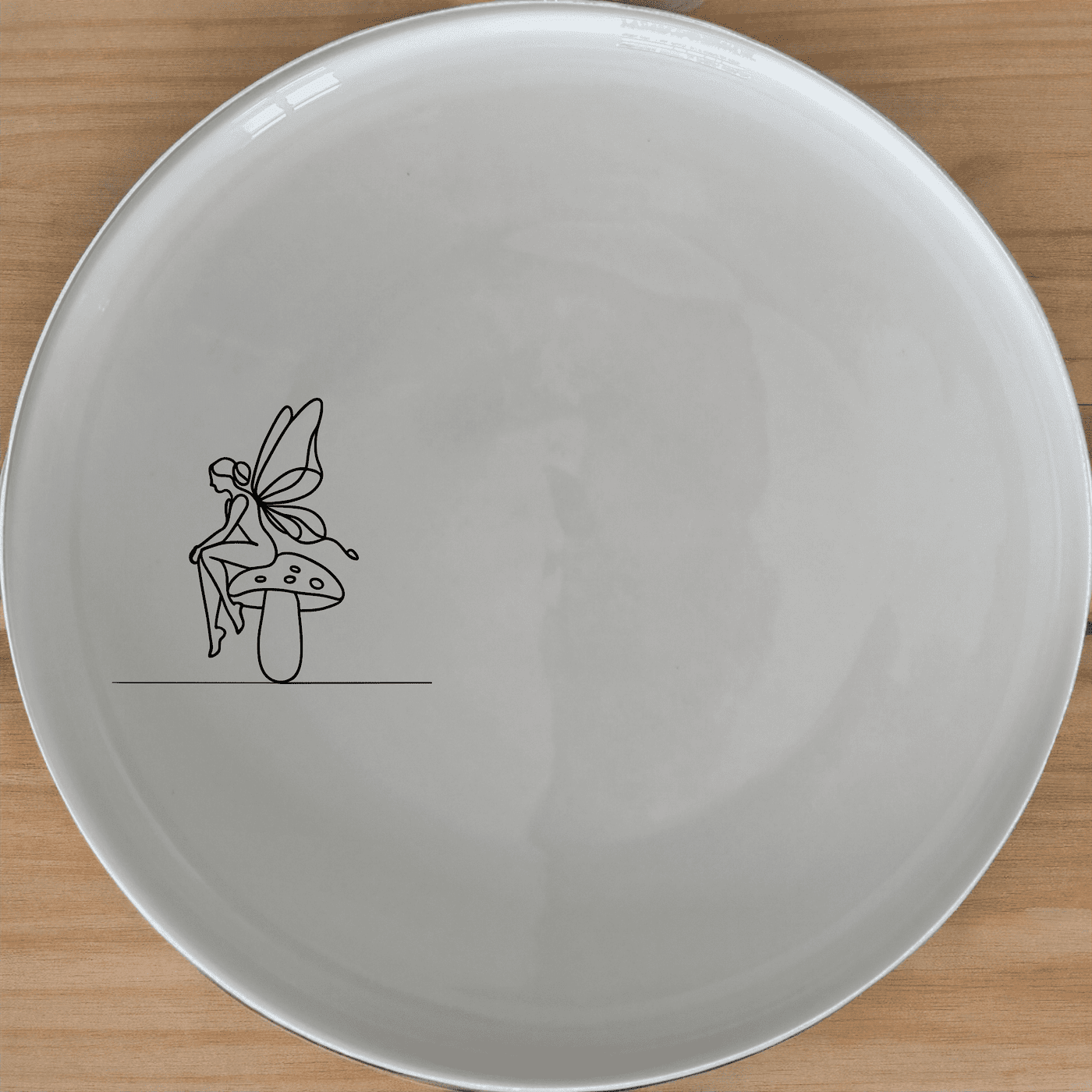 Delicate Fairy Toadstool Side Plate Set of 4 adds a whimsical touch to any dining setting with its elegant design.