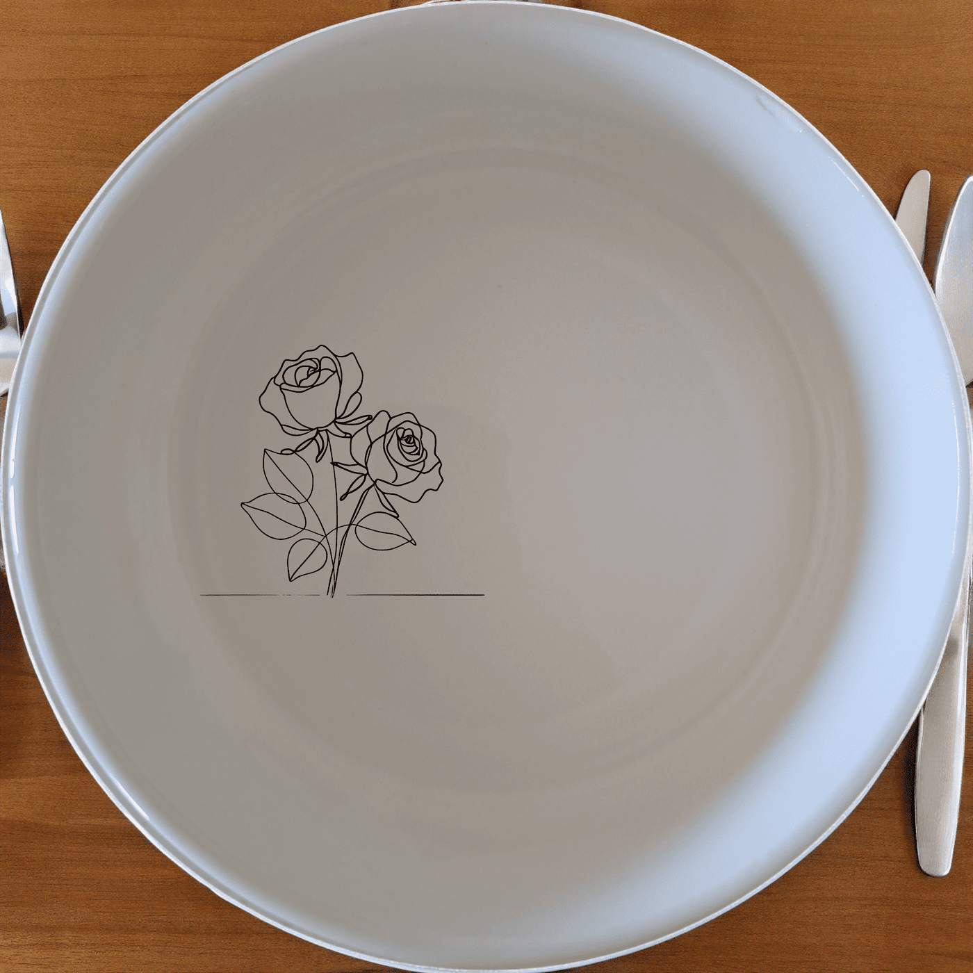 The Delicate Roses Bowl Set of 4 features a minimalist rose design, perfect for everyday use and special occasions.