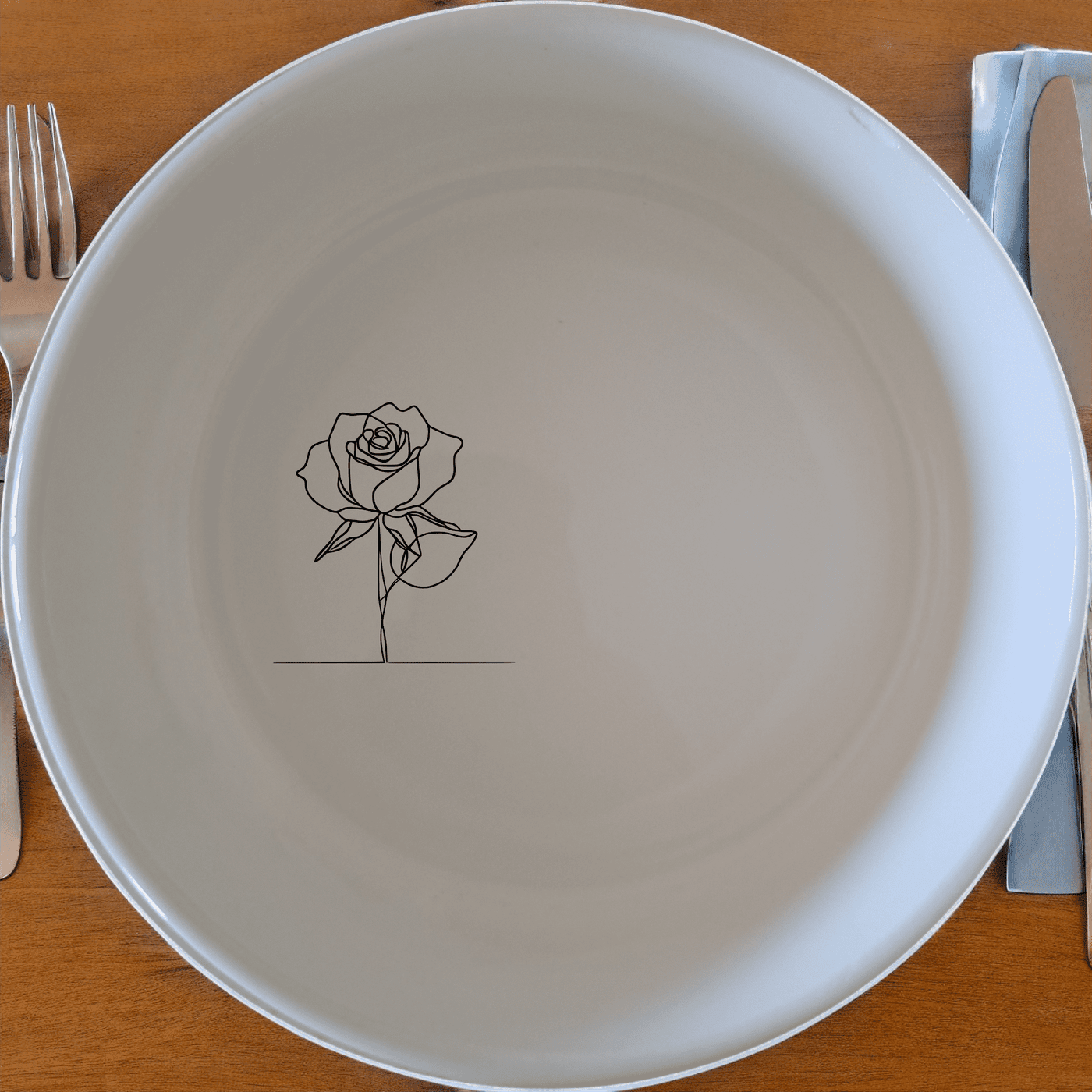 The Delicate Roses Bowl Set of 4 features a minimalist rose design, perfect for everyday use and special occasions.