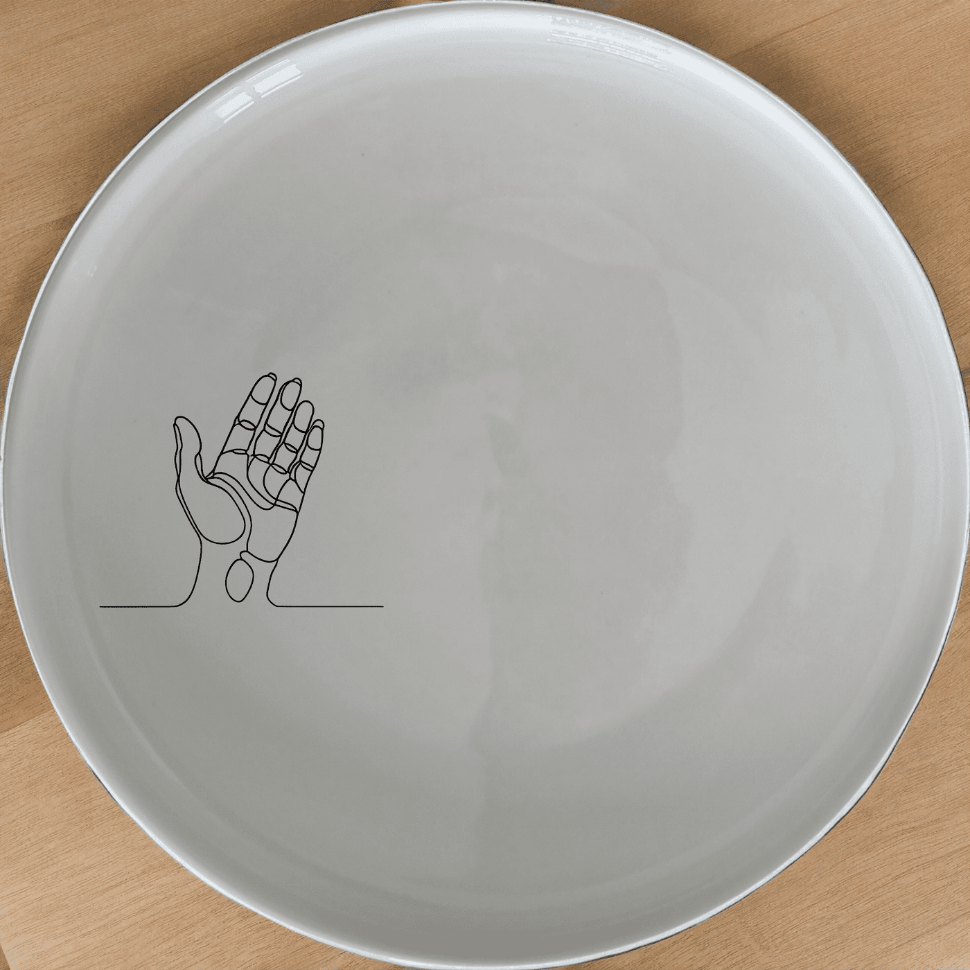 Drawing Hand Side Plate Set of 4 - Range 3 is a stylish and modern dinnerware set that adds an artistic touch to your dining experience.