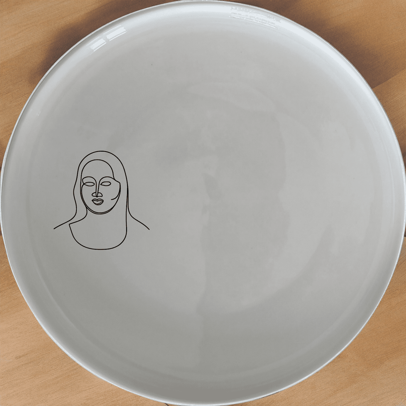 Curvy Fat Mona Lisa Face Dinner Plate Set of 4 - Range 1 is a stunning collection of ceramic plates featuring an abstract, artistic depiction of the iconic Mona Lisa. Perfect for modern and artistic home settings.