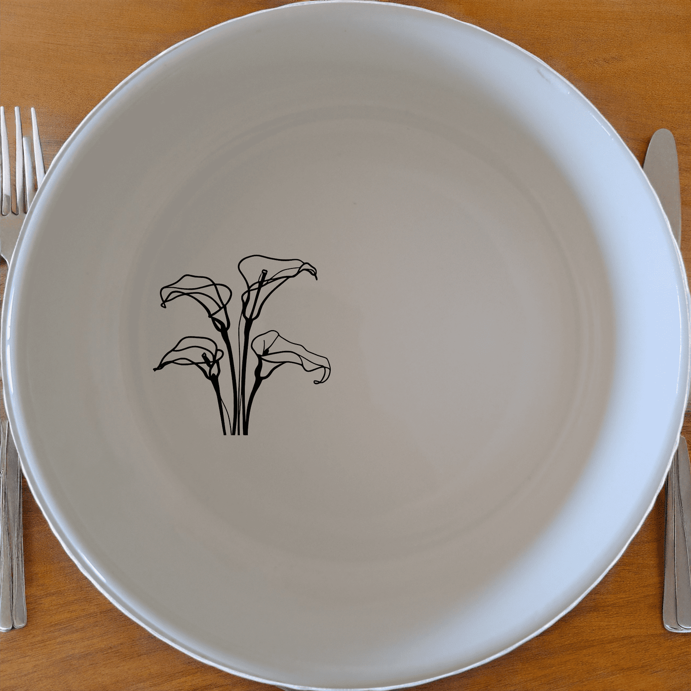 Arum Lilies Bowl Set of 4 - Range 3 is a beautiful set of four white ceramic bowls featuring a delicate laser-etched design of arum lilies, perfect for any dining occasion.