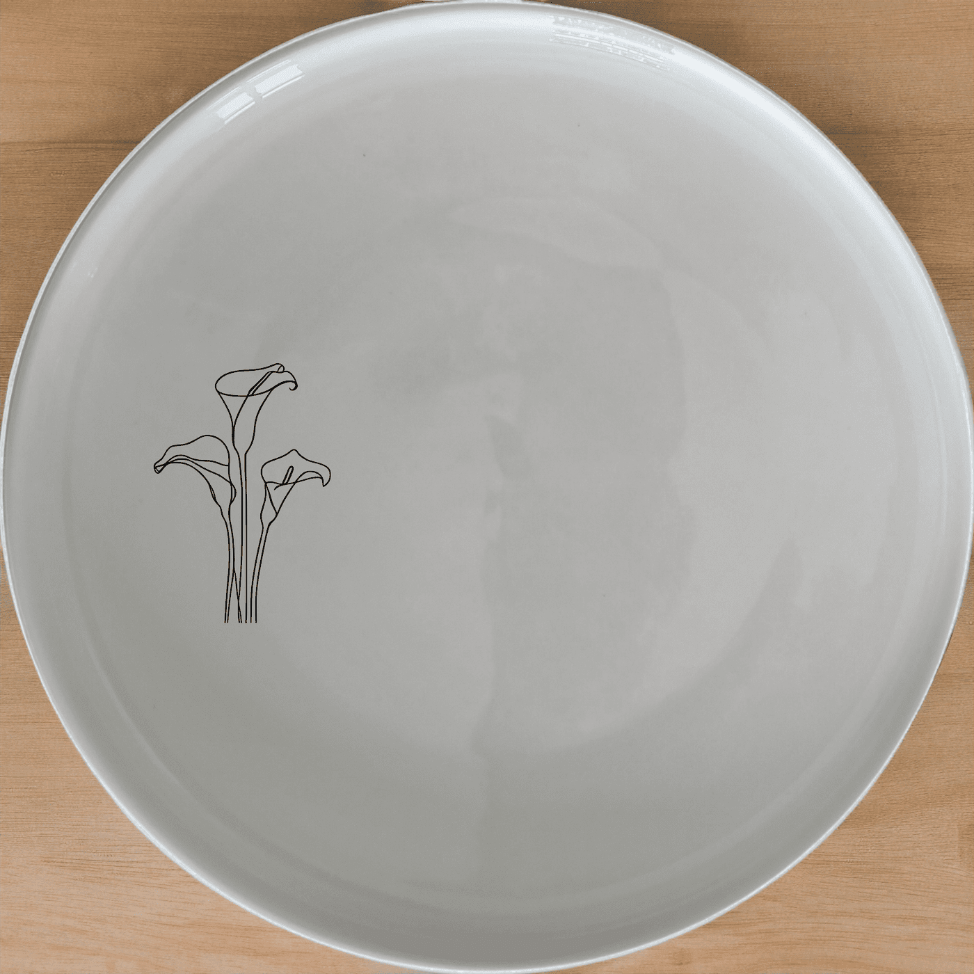 The Arum Lilies Side Plate Set of 4 - Range 4 brings a touch of elegance to your dining table with its delicate floral design.
