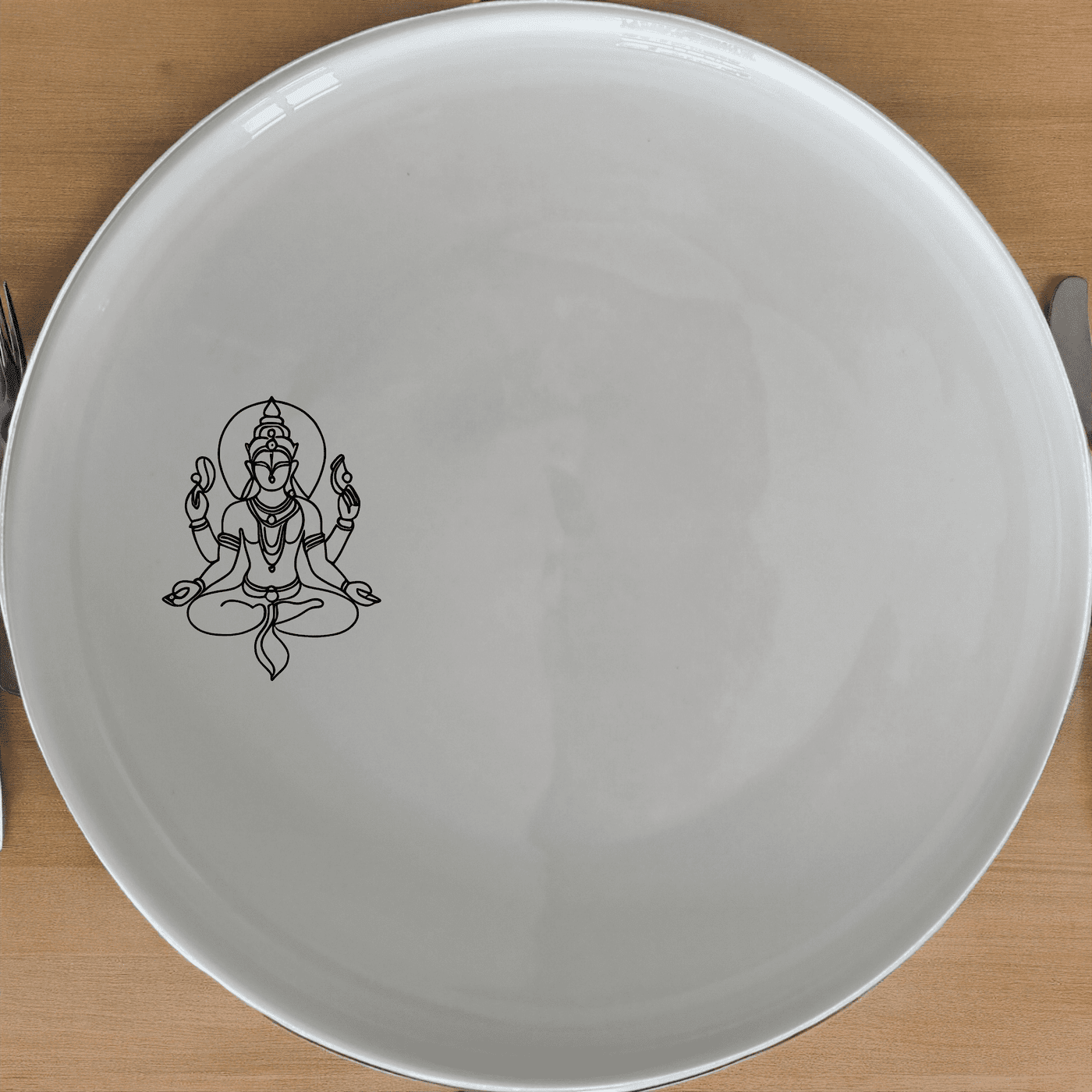 The Hindu Imagery Side Plate Set of 4 is a beautiful and spiritual addition to your dining table, perfect for any special occasion or everyday use.