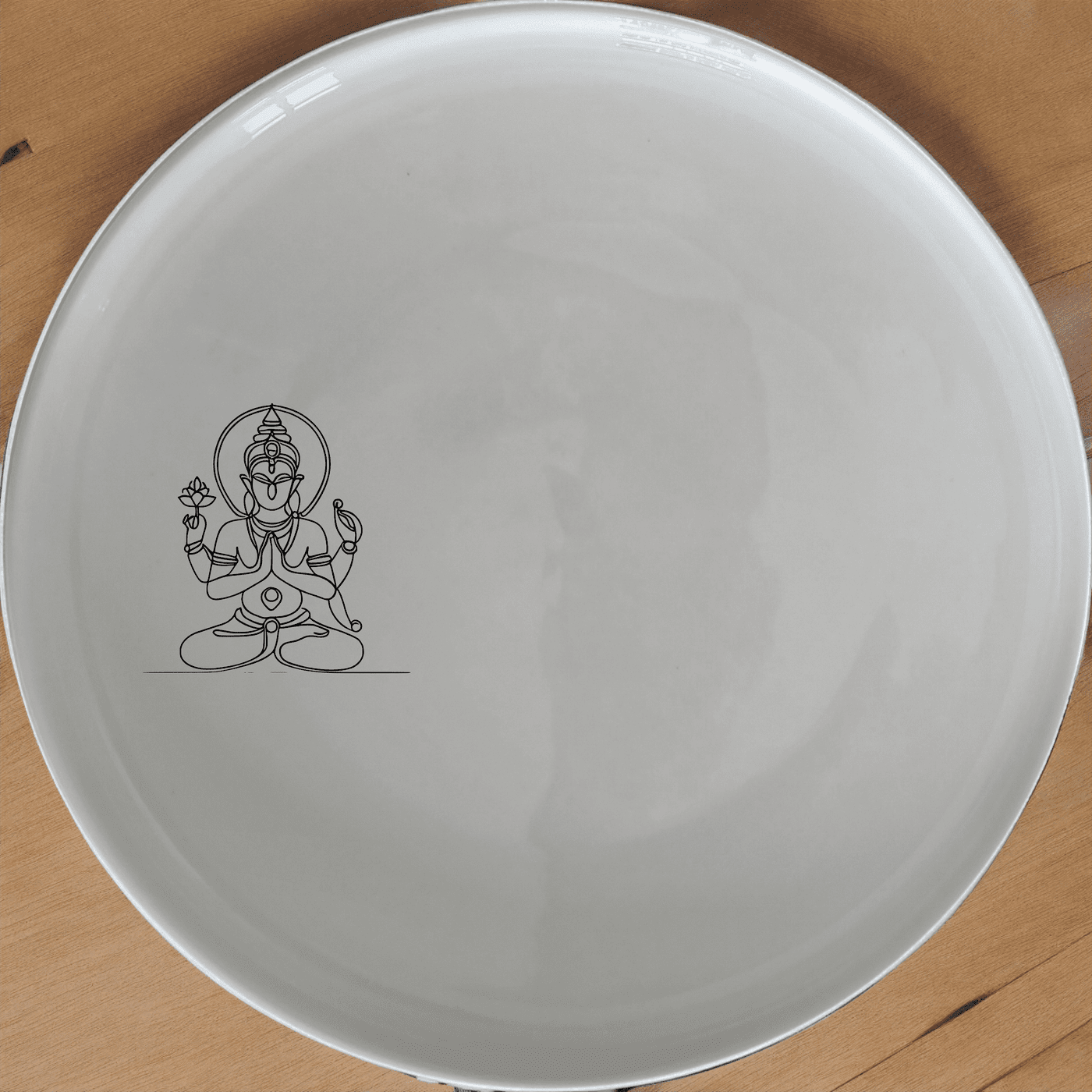 Discover the Hindu Imagery Side Plate Set of 4, a beautiful and culturally inspired addition to your dining collection.