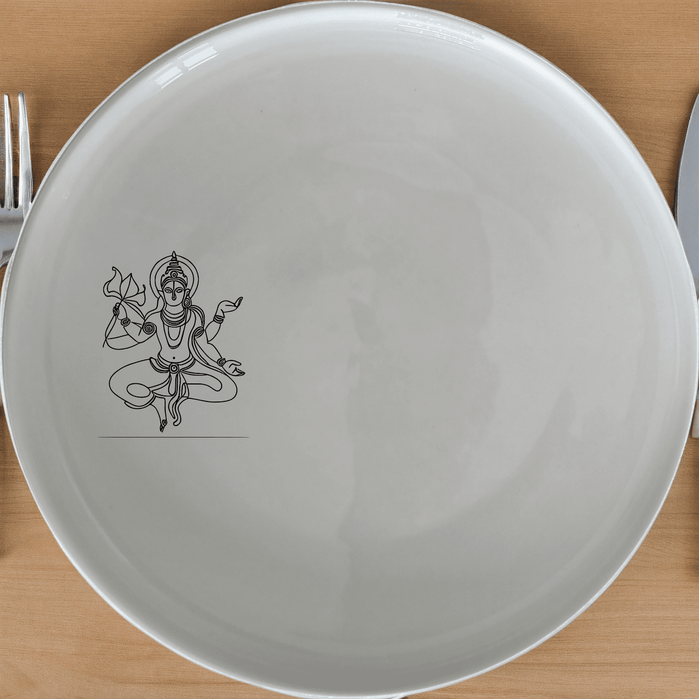 The Hindu Imagery Side Plate Set of 4 brings spiritual elegance to your dining table with intricate laser-etched designs.