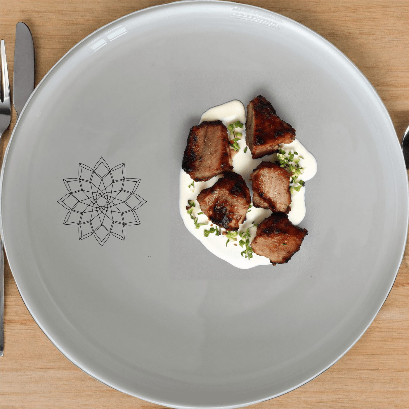 The Islamic Imagery Dinner Plate Set of 4 features elegant geometric designs, perfect for adding a touch of sophistication to any dining table.