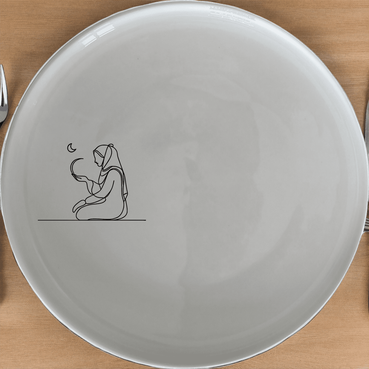 The Islamic Imagery Side Plate Set of 4 features minimalist, elegant designs perfect for any dining table. Crafted from durable ceramic, these plates are microwave and dishwasher safe, making them ideal for everyday use.