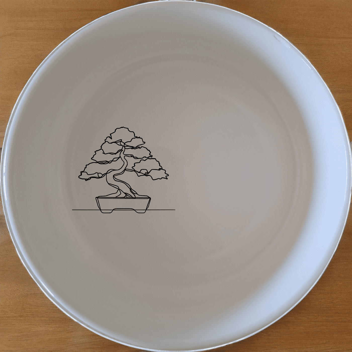 The Japanese Bonsai Tree Bowl Set of 4 - Range 1 features minimalist designs perfect for any modern kitchen or dining space.