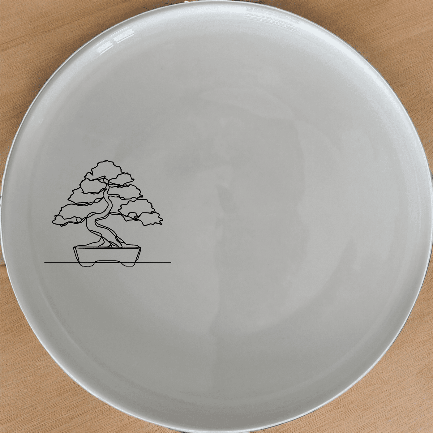 The Japanese Bonsai Tree Dinner Plate Set of 4 - Range 1 features a minimalist design perfect for any dining occasion.