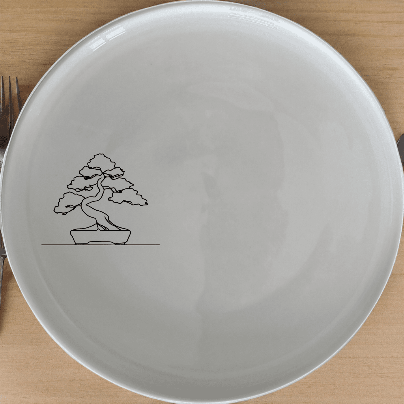 The Japanese Bonsai Tree Dinner Plate Set of 4 - Range 3 features a minimalist design perfect for modern dining. Each plate showcases a delicate bonsai tree illustration, adding an artistic touch to your table setting.