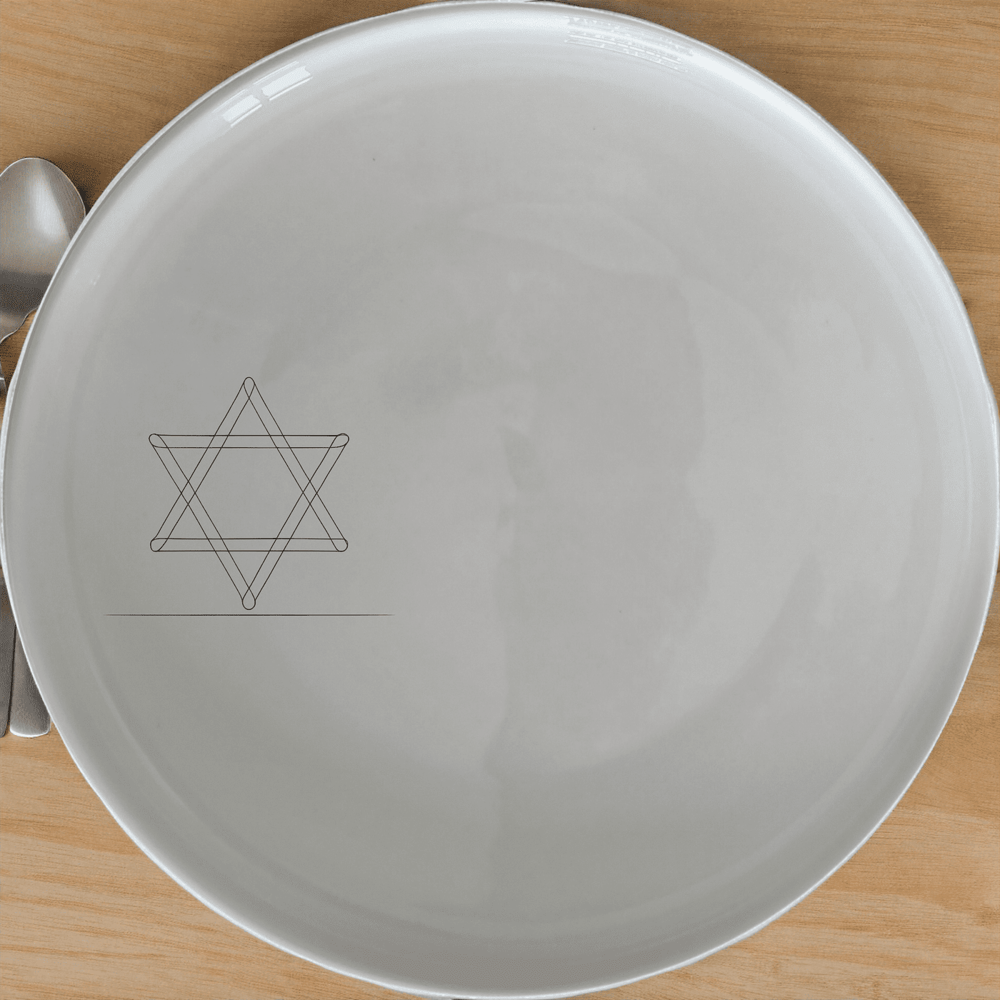 The Jewish Imagery Dinner Plate Set of 4 features a subtle yet meaningful design, perfect for everyday use or special occasions.