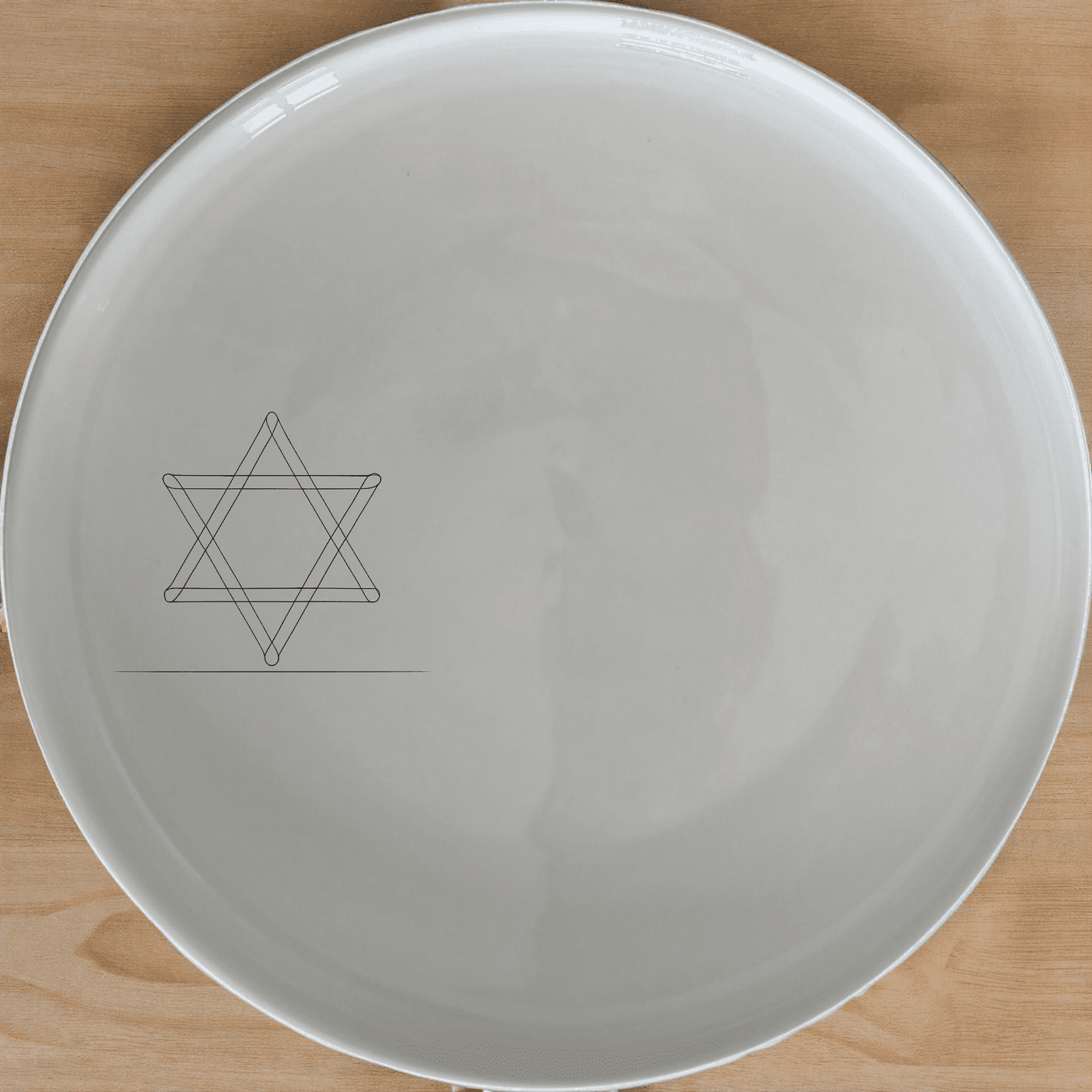 The Jewish Imagery Side Plate Set of 4 features a subtle yet meaningful design, perfect for adding a touch of heritage to your dining experience.