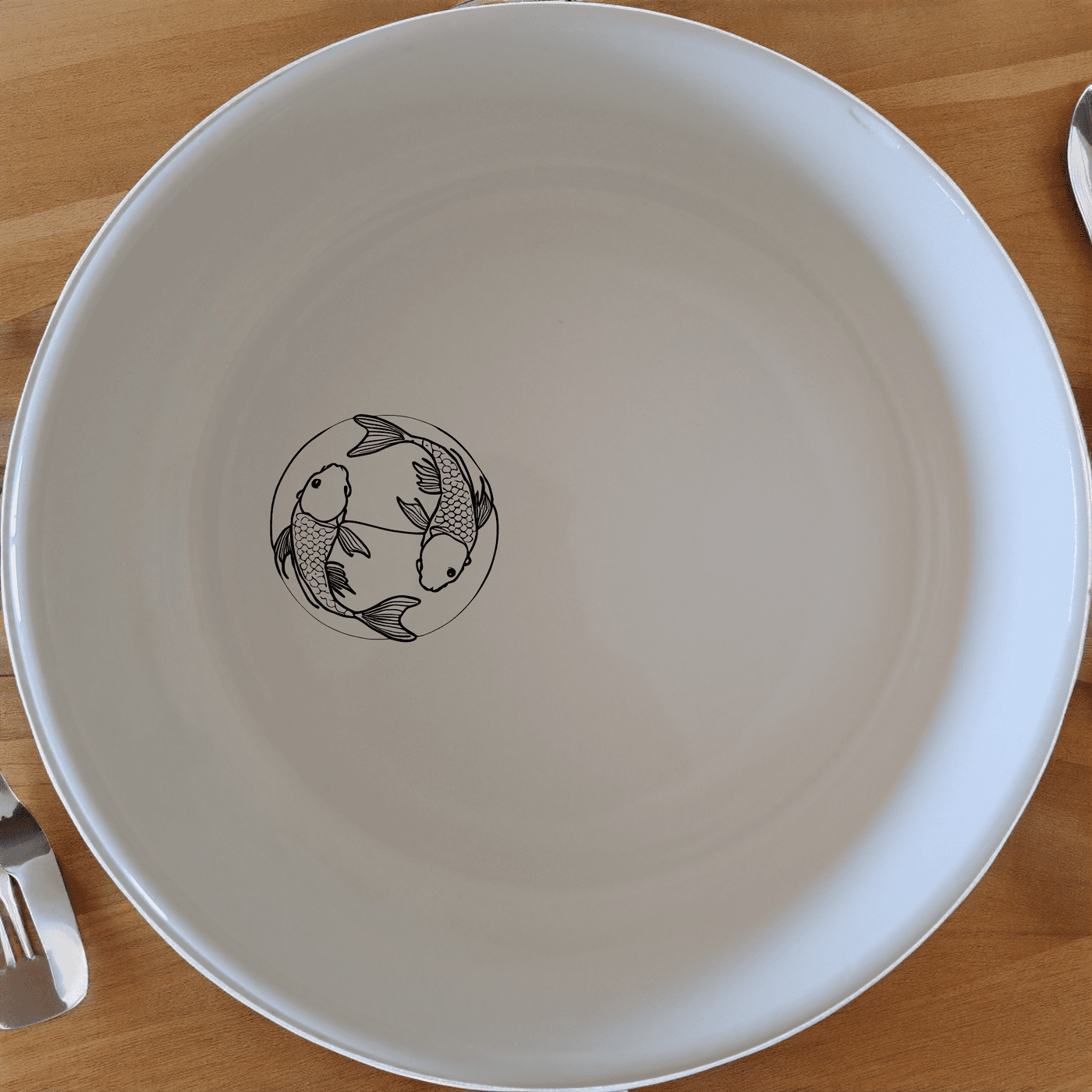 The Yingyang Koi Fish Bowl Set of 4 features a harmonious design inspired by ancient symbolism, perfect for adding a touch of serenity to your dining experience.