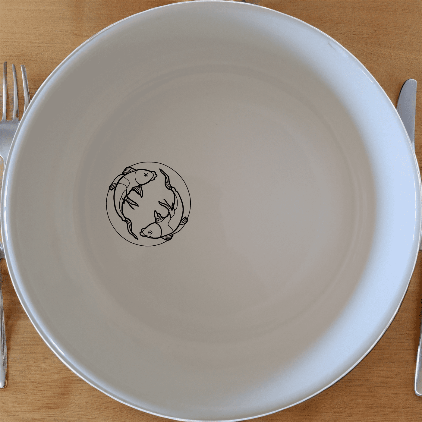 The Yingyang Koi Fish Bowl Set of 4 features a harmonious design inspired by ancient symbolism, perfect for adding a touch of serenity to any dining table.