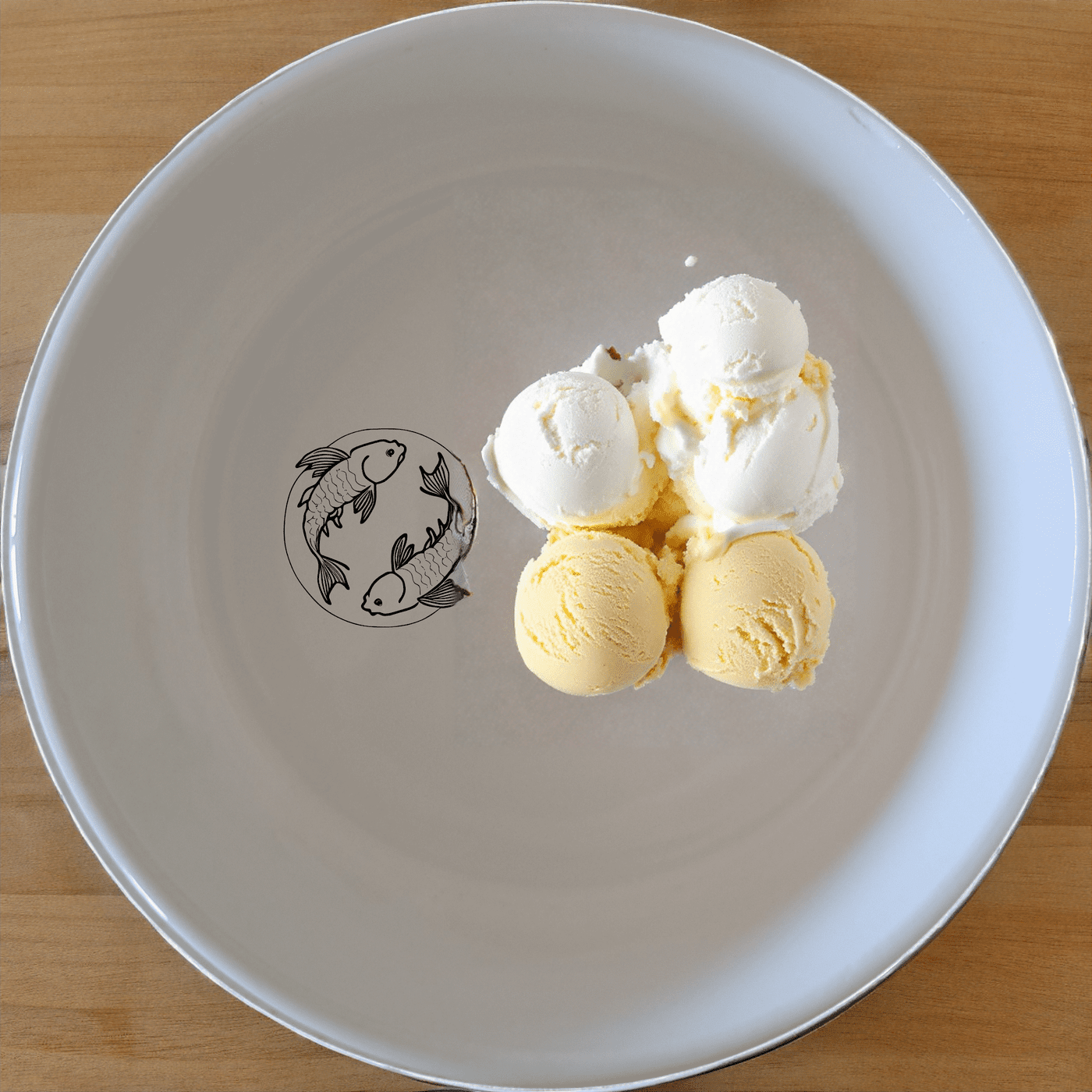 The Yingyang Koi Fish Bowl Set of 4 features a harmonious design inspired by the yin-yang symbol, perfect for adding an artistic touch to your dining experience.