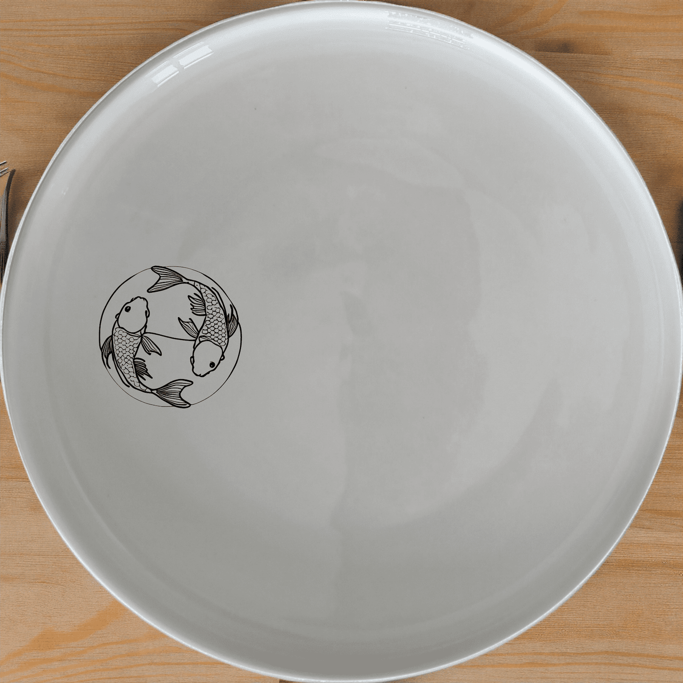 The Yingyang Koi Fish Dinner Plate Set of 4 features a serene design, perfect for elevating any dining experience.