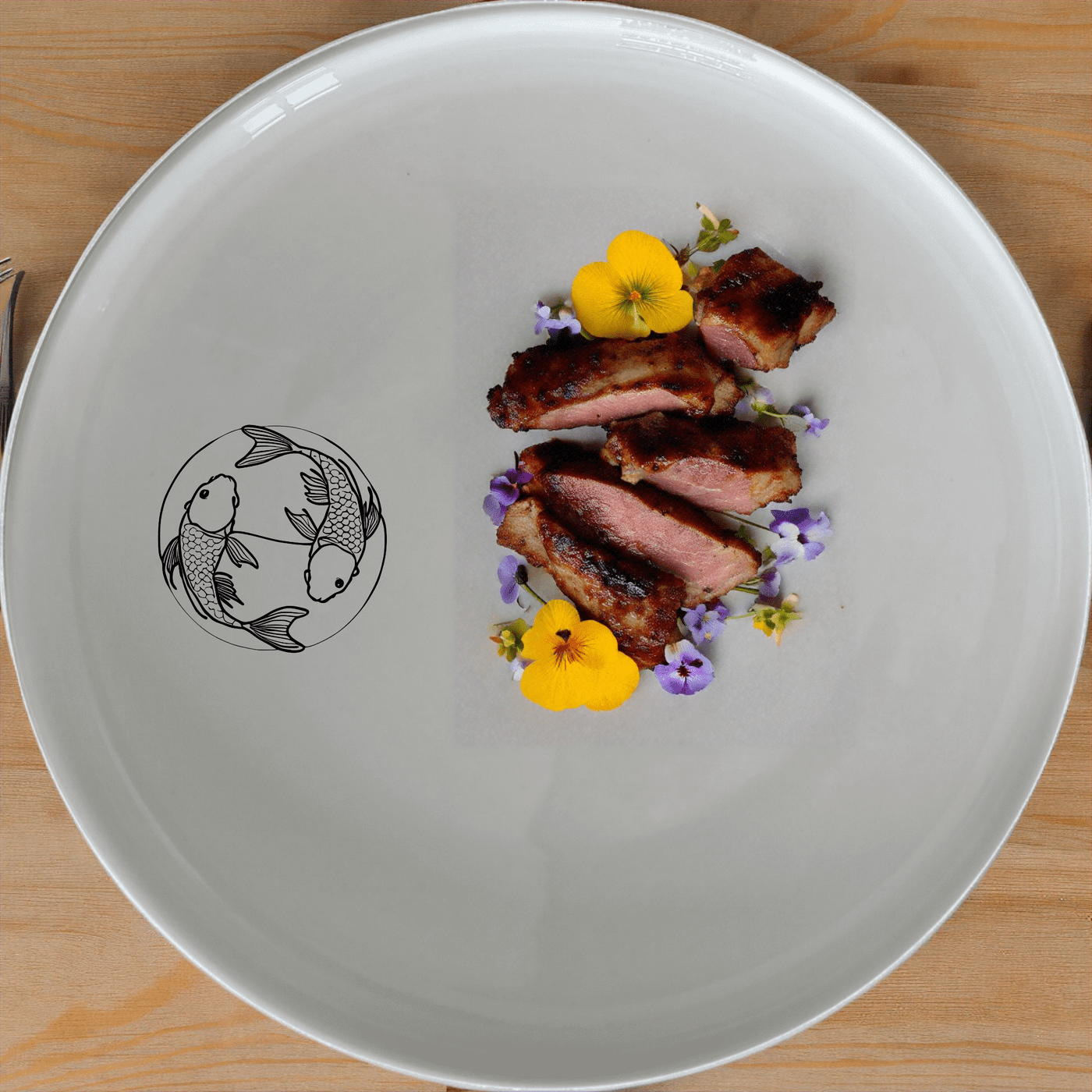The Yingyang Koi Fish Dinner Plate Set of 4 features a serene design, perfect for elevating any dining experience.
