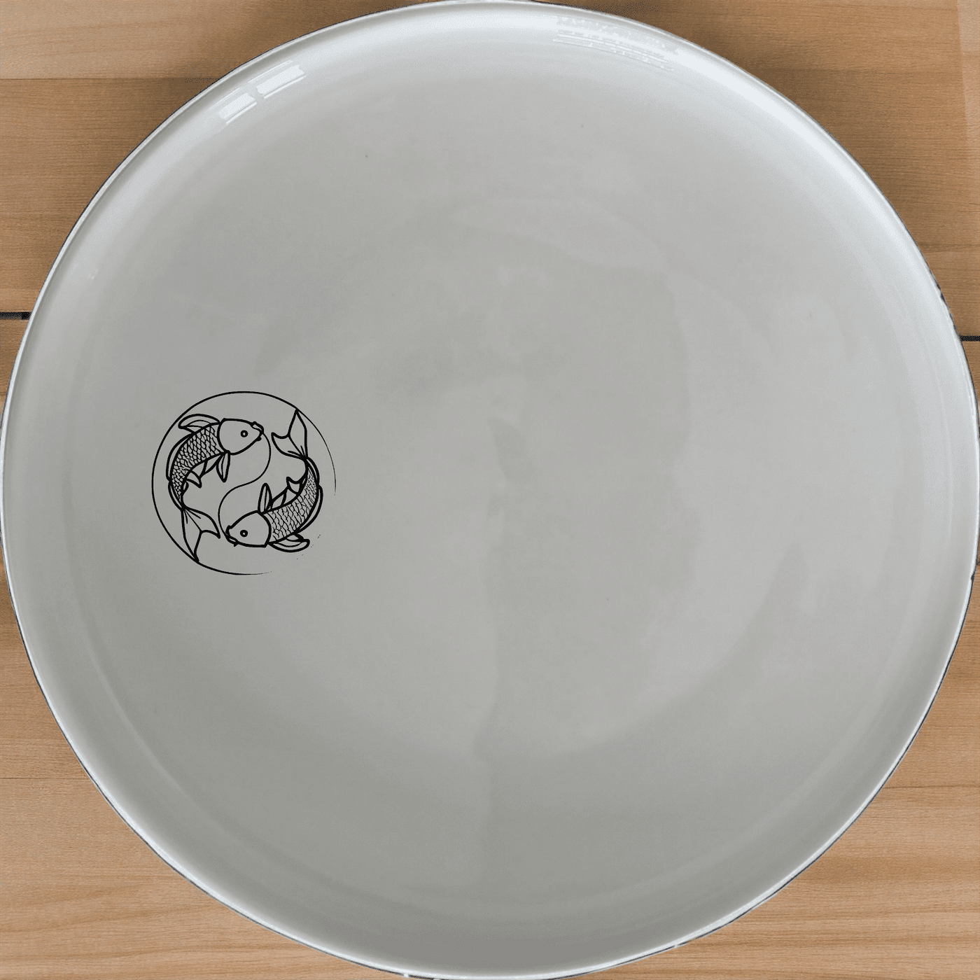 The Yingyang Koi Fish Dinner Plate Set of 4 features a serene design perfect for any dining occasion.