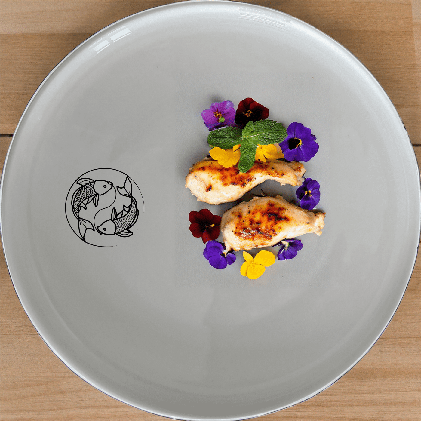 The Yingyang Koi Fish Dinner Plate Set of 4 features a serene design perfect for any dining occasion.