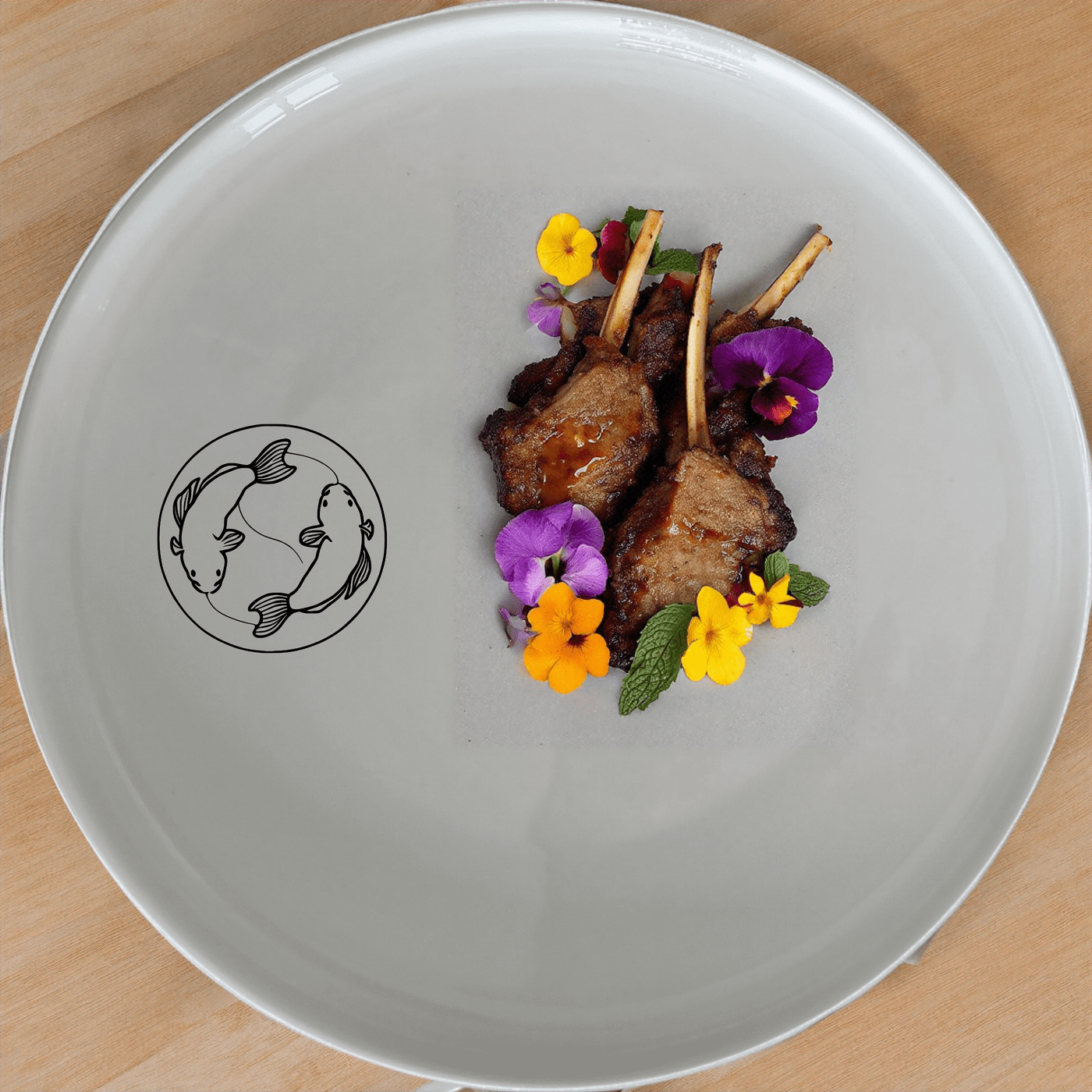 The Yingyang Koi Fish Dinner Plate Set of 4 features a harmonious design perfect for any dining occasion.