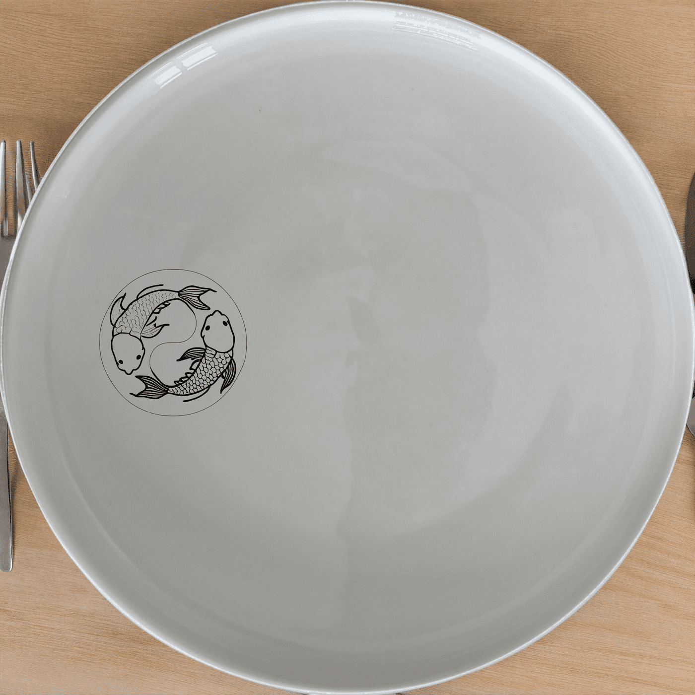 The Yingyang Koi Fish Side Plate Set of 4 features a harmonious design that brings balance and tranquility to your dining experience.