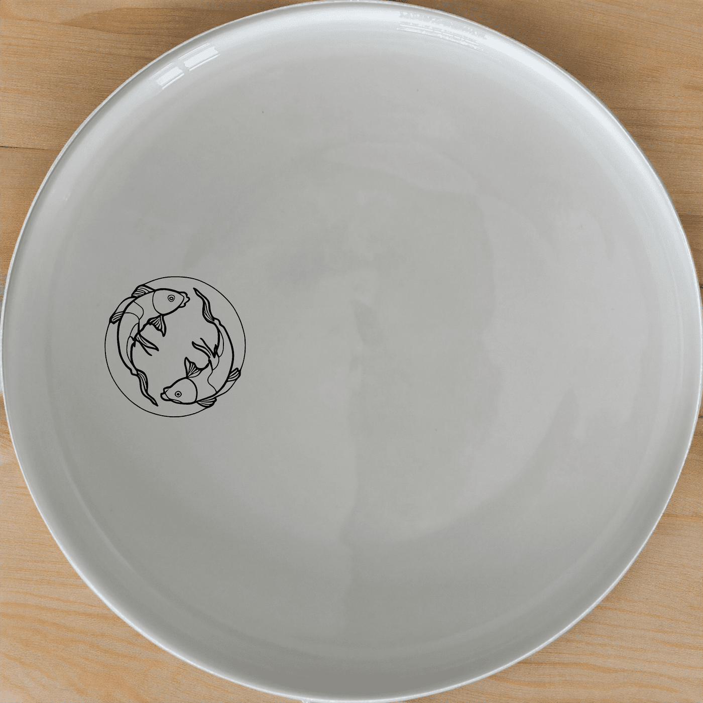 The Yingyang Koi Fish Side Plate Set of 4 features a harmonious design inspired by ancient Chinese philosophy, perfect for modern dining.
