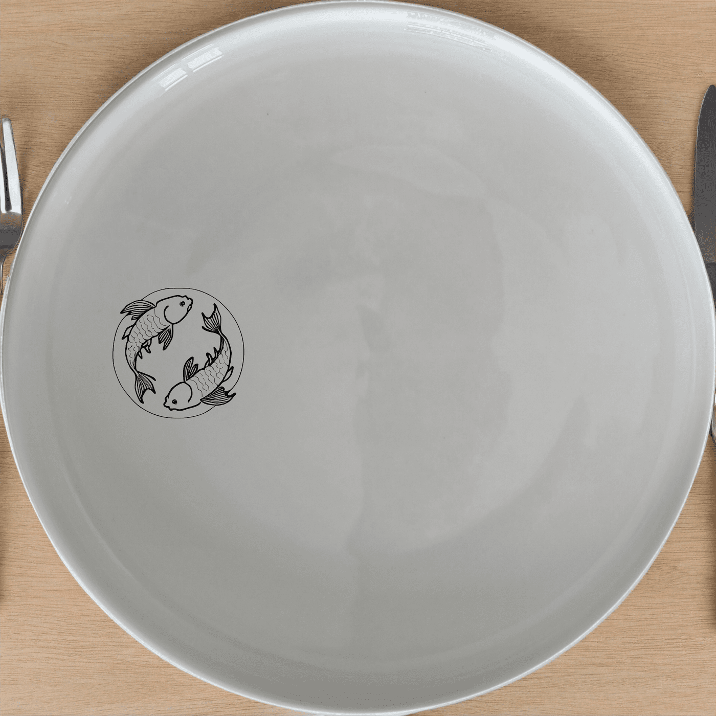 The Yingyang Koi Fish Side Plate Set of 4 features a harmonious design inspired by the balance of yin and yang, perfect for adding a touch of serenity to any dining setting.