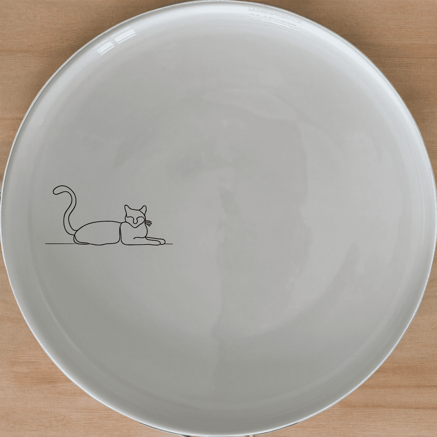 Lazy Stretching Cat Side Plate Set of 4 - Range 3 is a charming and stylish addition to any dining table.