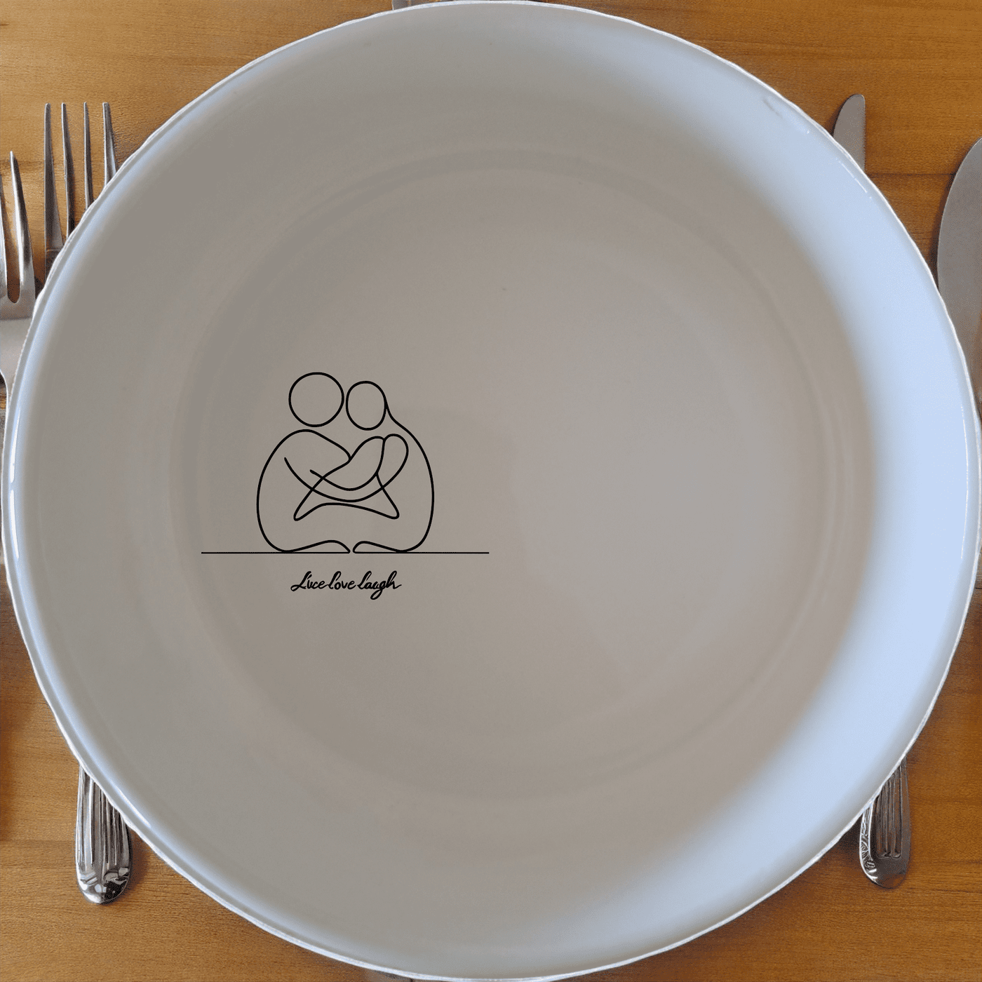 Live Love Laugh Bowl Set of 4 - Range 1 is a charming set of four white ceramic bowls, each featuring an elegant laser-etched design.