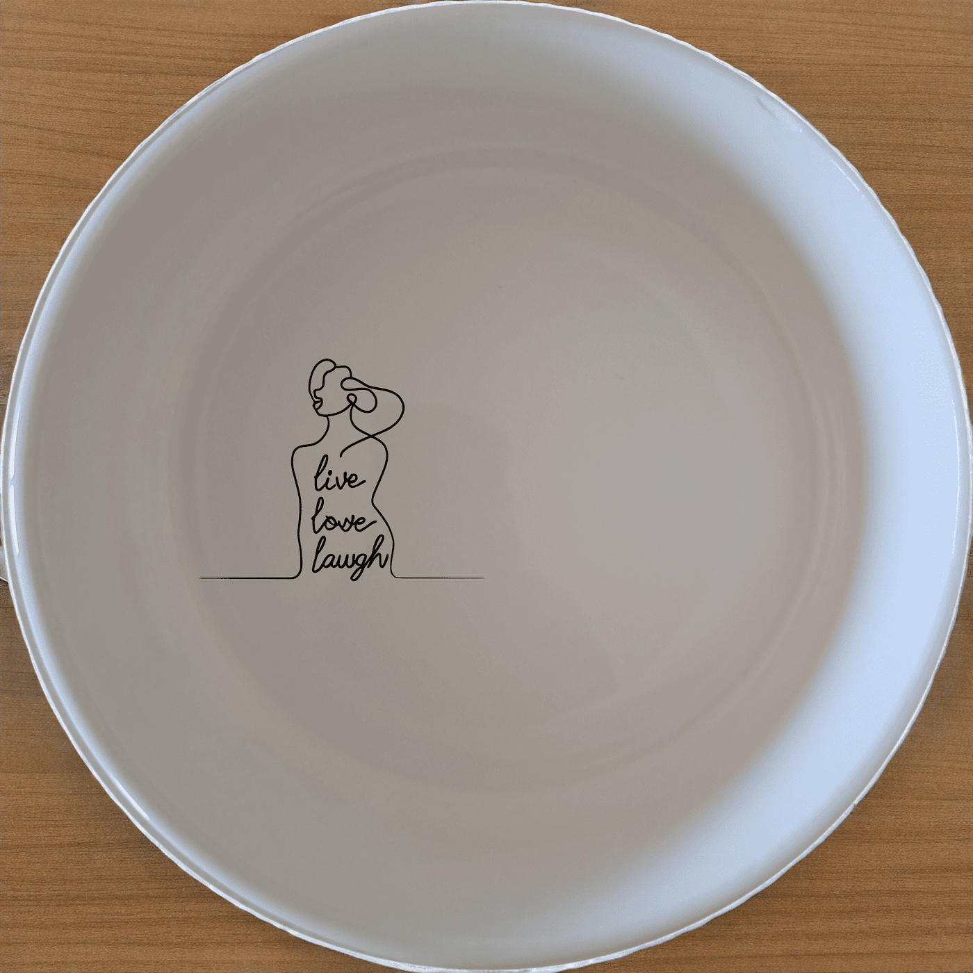 Live Love Laugh Bowl Set of 4 - Range 4 is a charming and versatile set perfect for everyday use or special occasions.