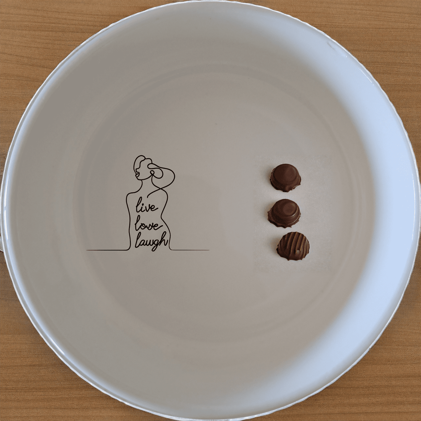 Live Love Laugh Bowl Set of 4 - Range 4 is a charming and versatile set perfect for everyday use or special occasions.