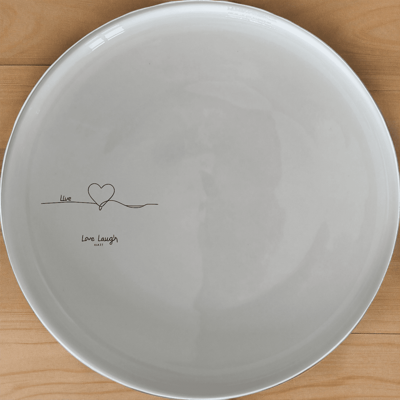 Live Love Laugh Dinner Plate Set of 4 - Range 2 is a beautiful and elegant dinner plate set that features a minimalist design with the words "Live Love Laugh" etched onto each plate.