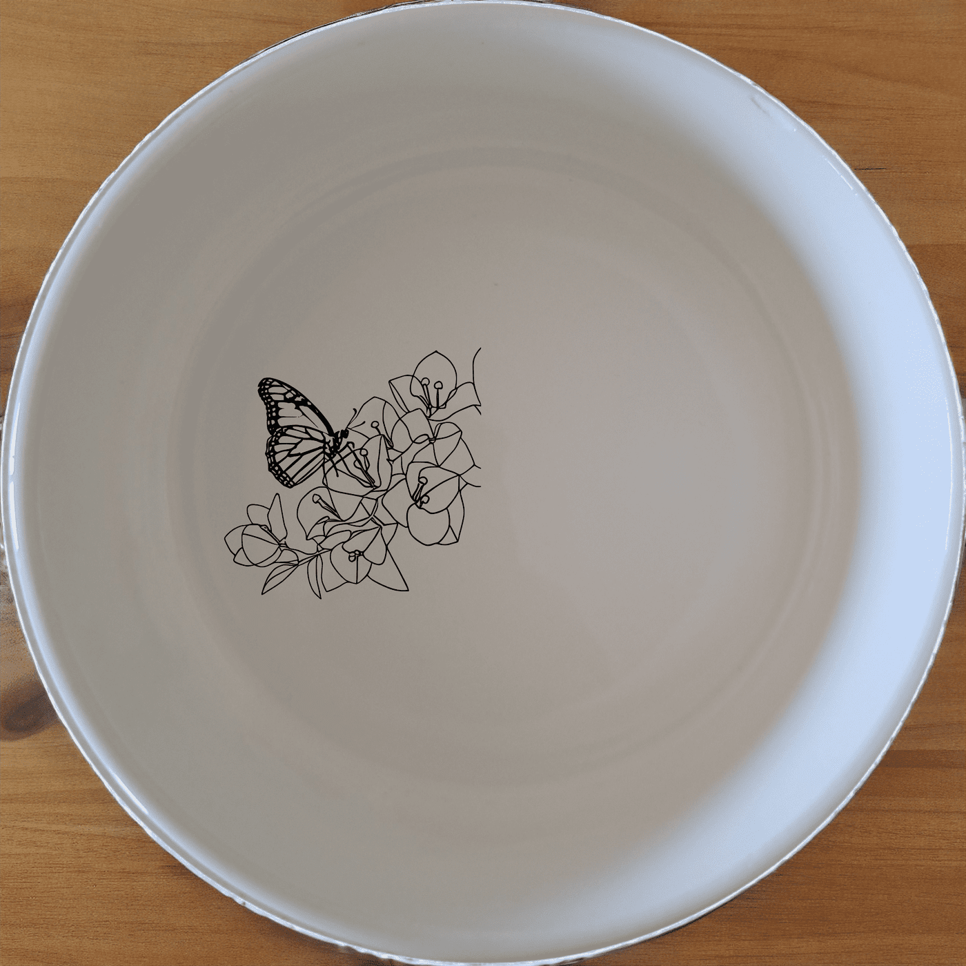 Monarch Butterfly Bougainvillea Bowl Set of 4 - Range 2 is a stunning set of four 12cm ceramic bowls featuring a delicate laser-etched design of a monarch butterfly and bougainvillea flowers, perfect for everyday use or special occasions.