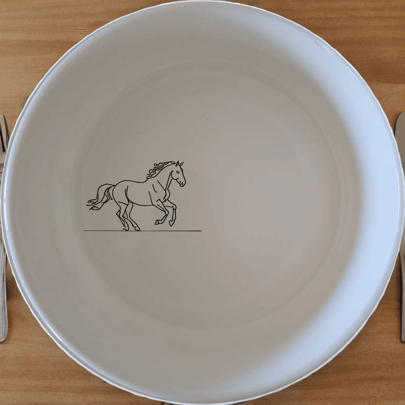 The Running Horses Bowl Set of 4 features elegant silhouettes of two running horses on each bowl, perfect for adding a touch of nature to your dining experience.