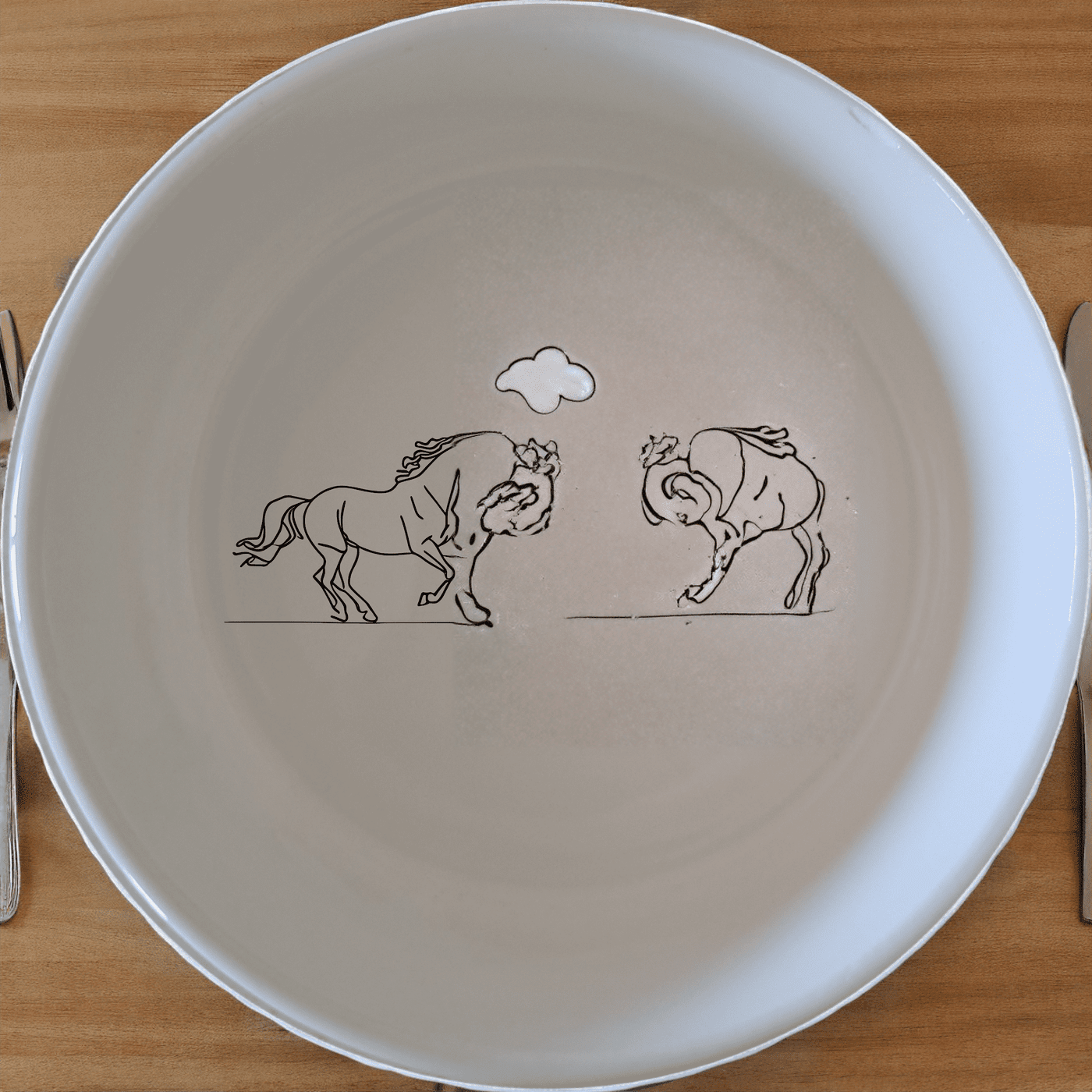 The Running Horses Bowl Set of 4 features elegant silhouettes of two running horses on each bowl, perfect for adding a touch of nature to your dining experience.