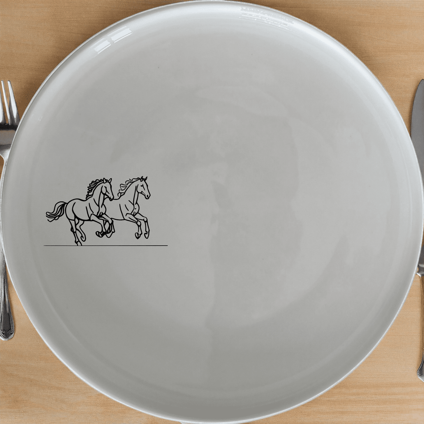 The Running Horses Side Plate Set of 4 features a sleek silhouette of two horses in motion, perfect for adding a touch of elegance to any dining setting.