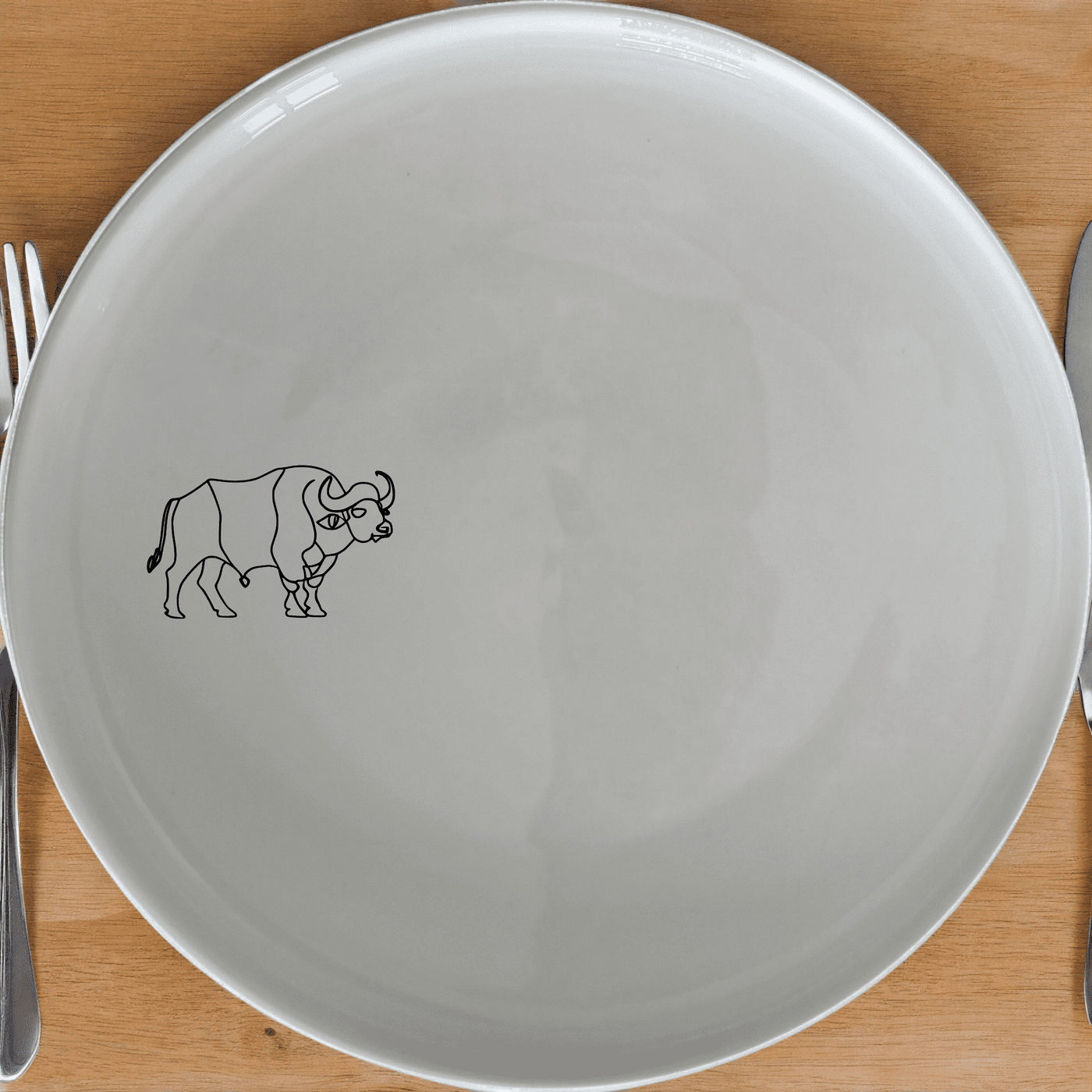 The Buffalo Silhouette Dinner Plate Set of 4 features a striking silhouette design, perfect for modern dining and everyday use.