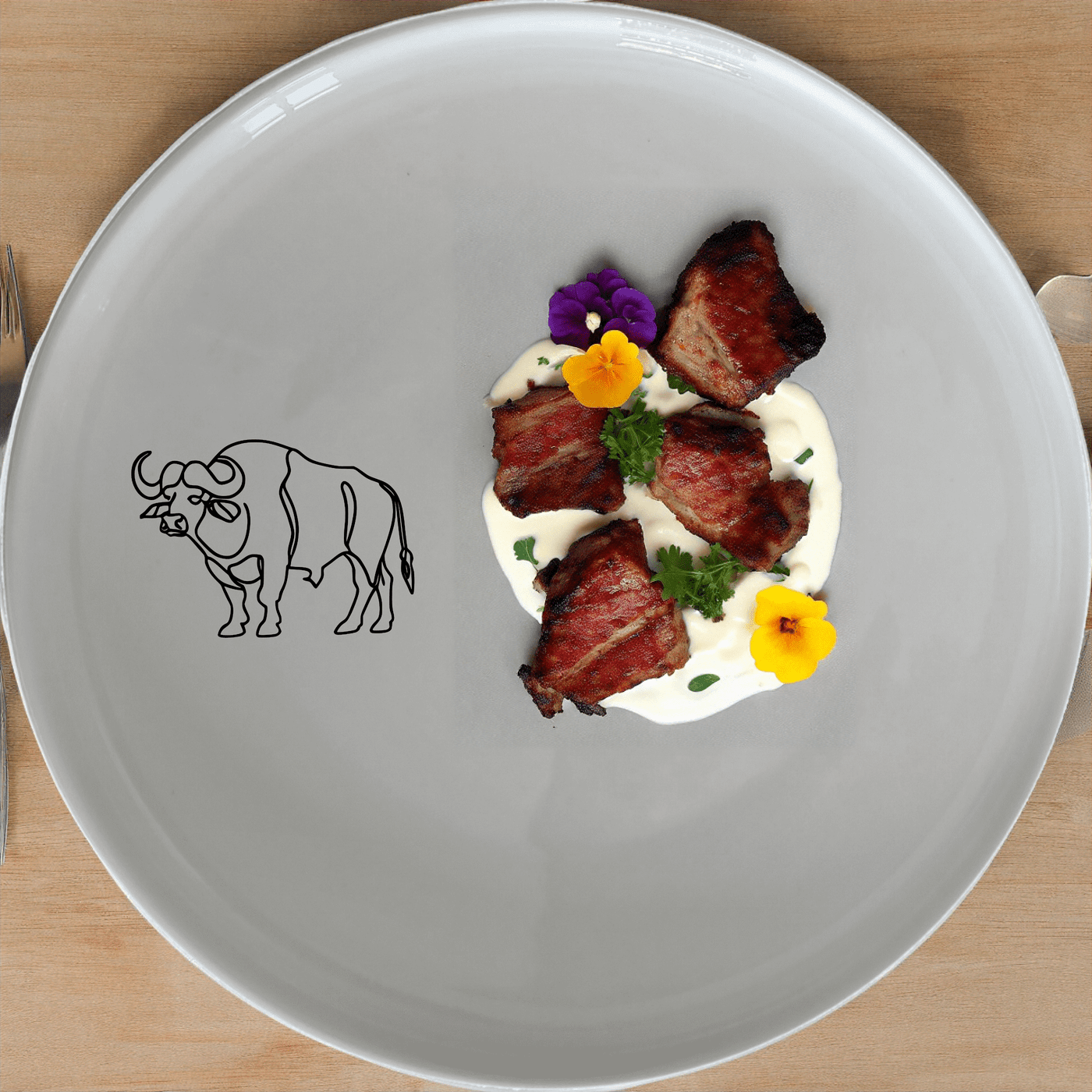 The Silhouette African Buffalo Dinner Plate Set of 4 adds a touch of wildlife elegance to your dining table with its sleek, minimalist design.