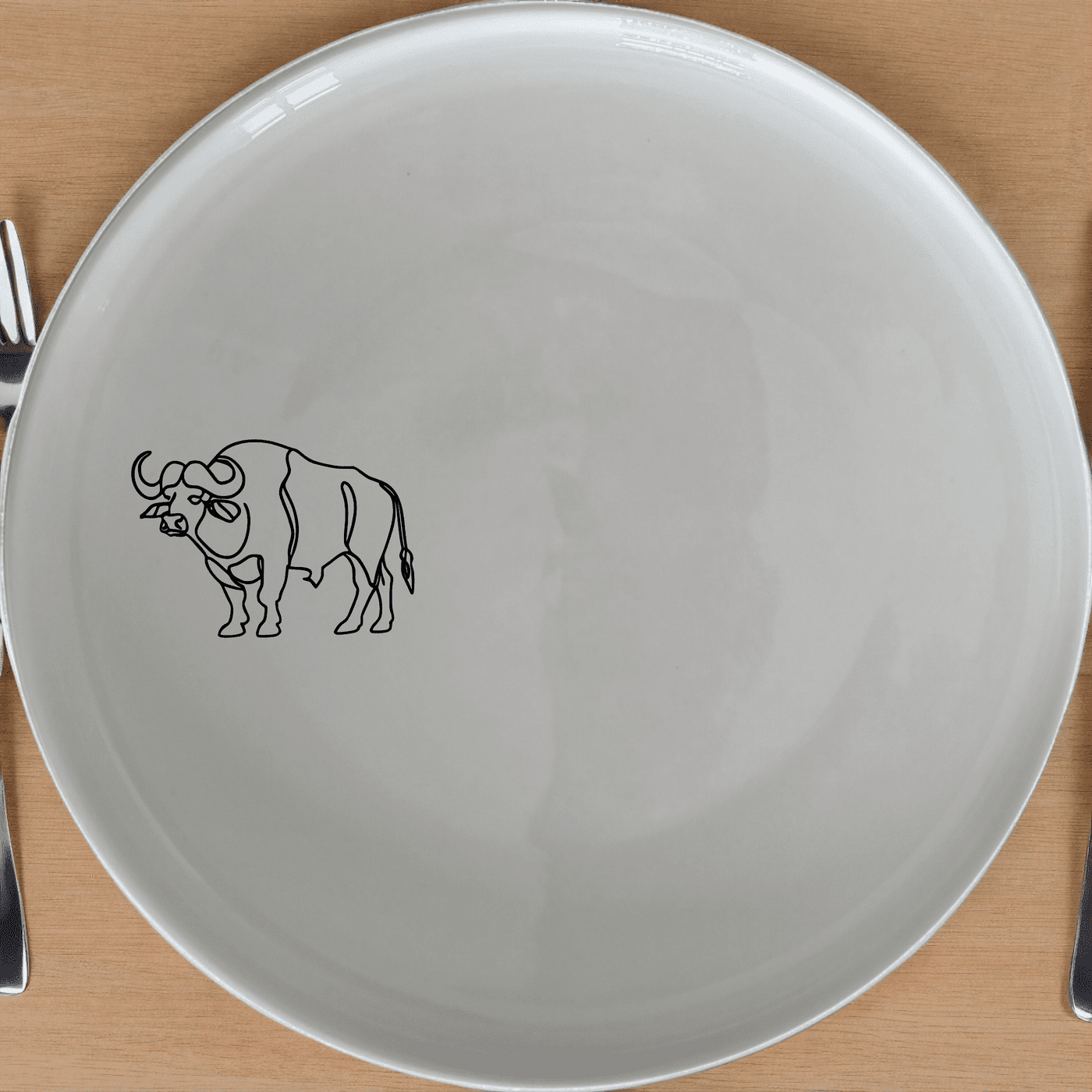 The Silhouette Big Five African Buffalo Side Plate Set of 4 features a striking silhouette design, perfect for adding a touch of wildlife elegance to your dining table.