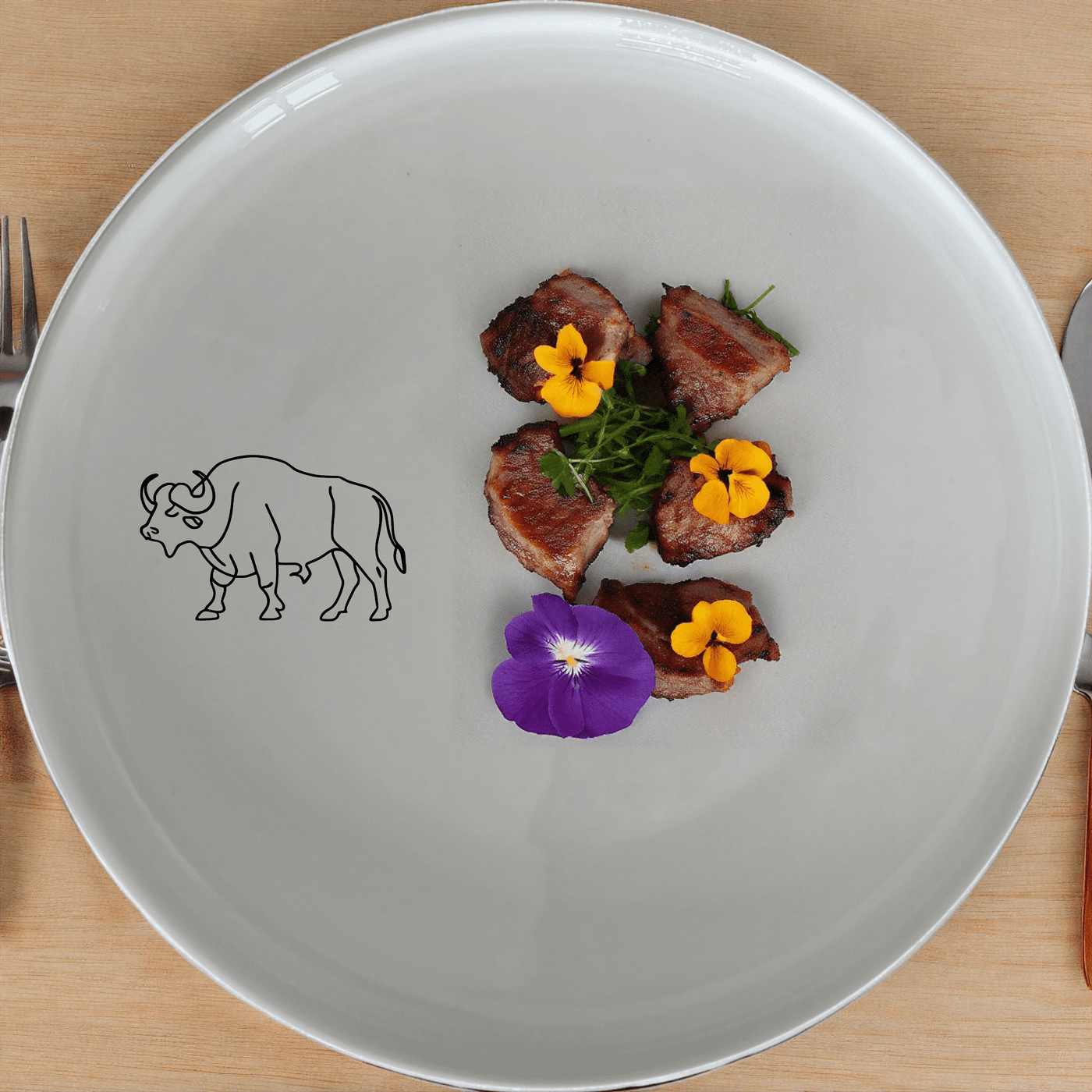 The African Buffalo Side Plate Set of 4 features a sleek silhouette design, perfect for modern dining and everyday use.